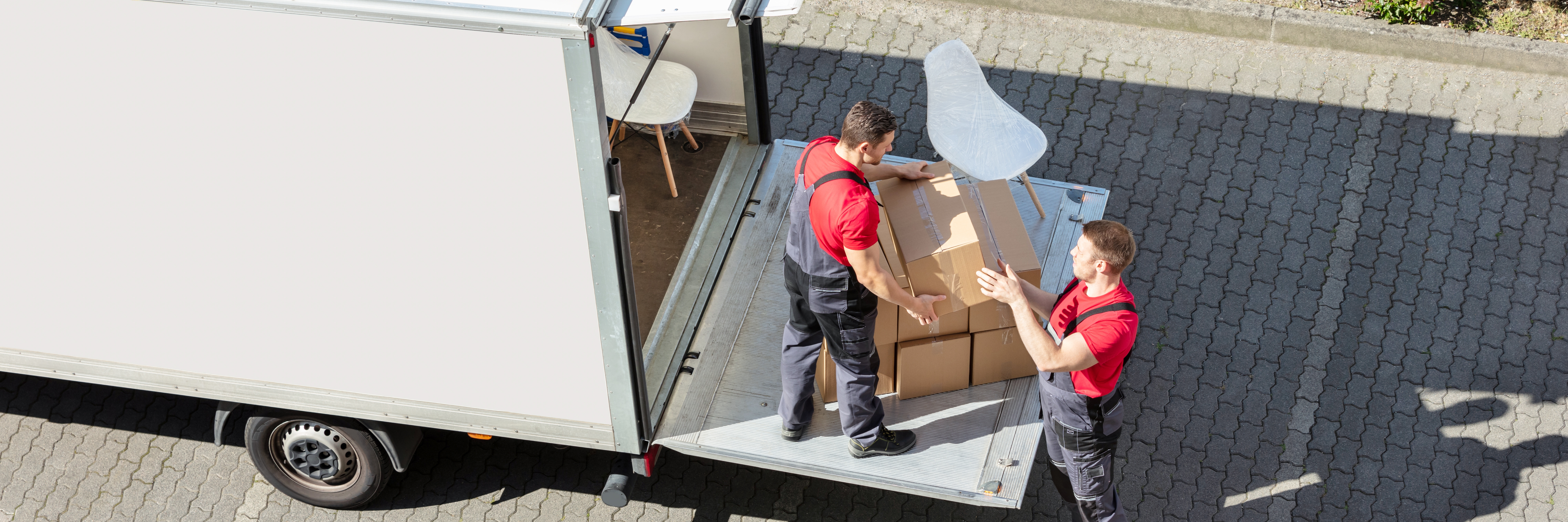 Movers With Van Or Truck. Moving And Delivery. | Source: Shutterstock
