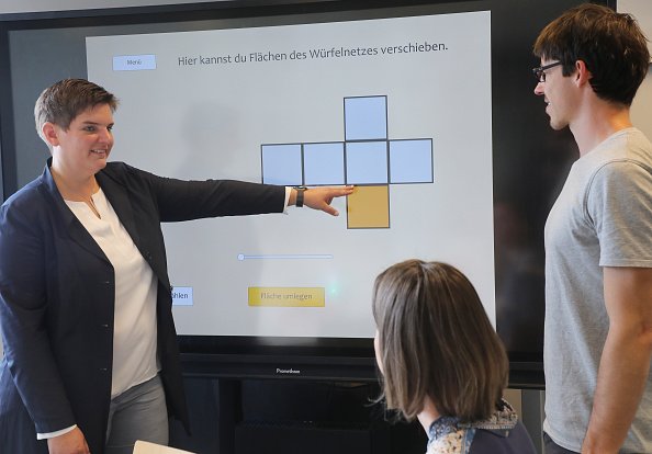 Teacher and student having an interactive session | Photo: Getty Images