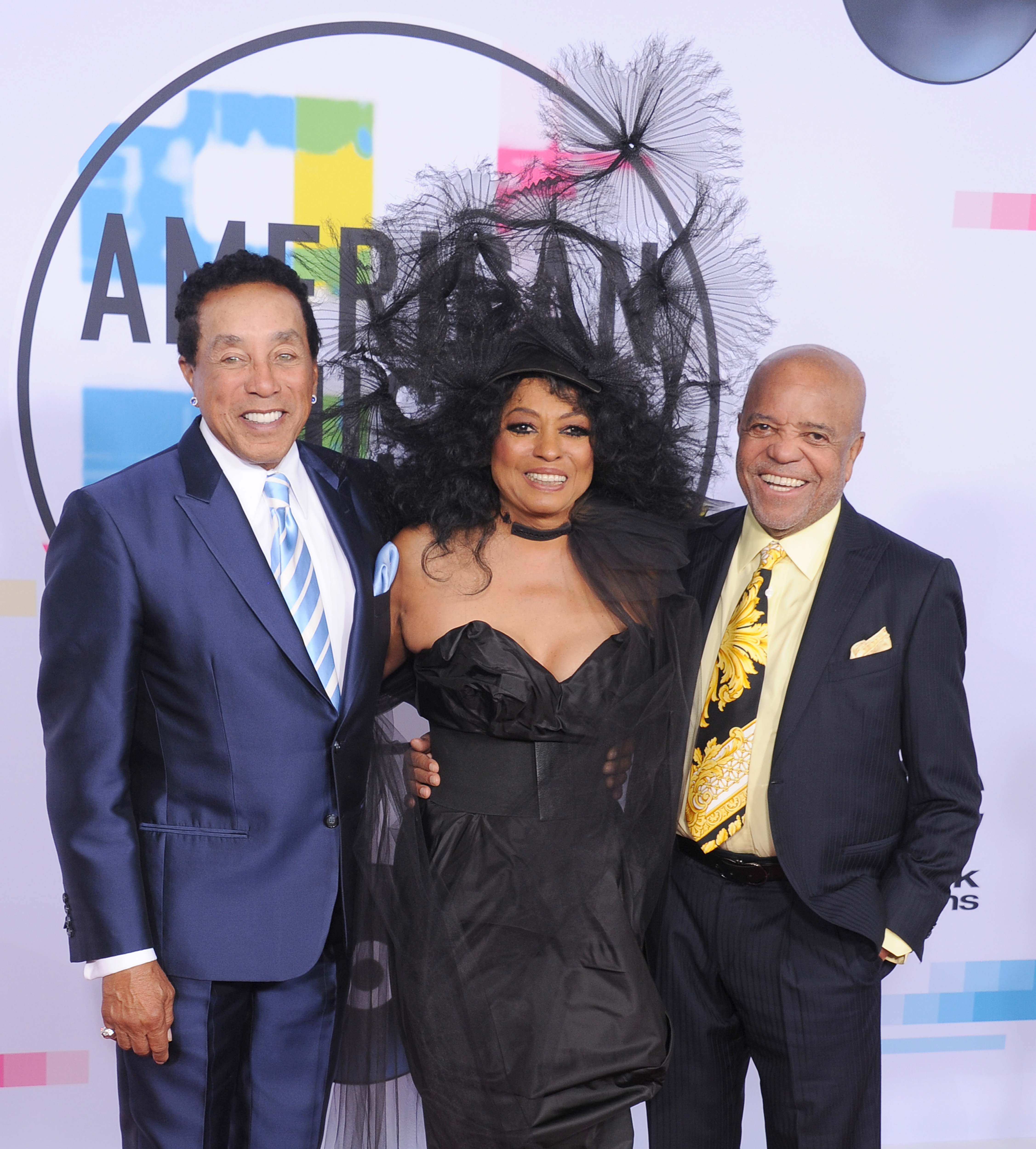 Smokey Robinson, Diana Ross, and Berry Gordy arrive at the American Music Awards at Microsoft Theater on November 19, 2017, in Los Angeles, California | Source: Getty Images