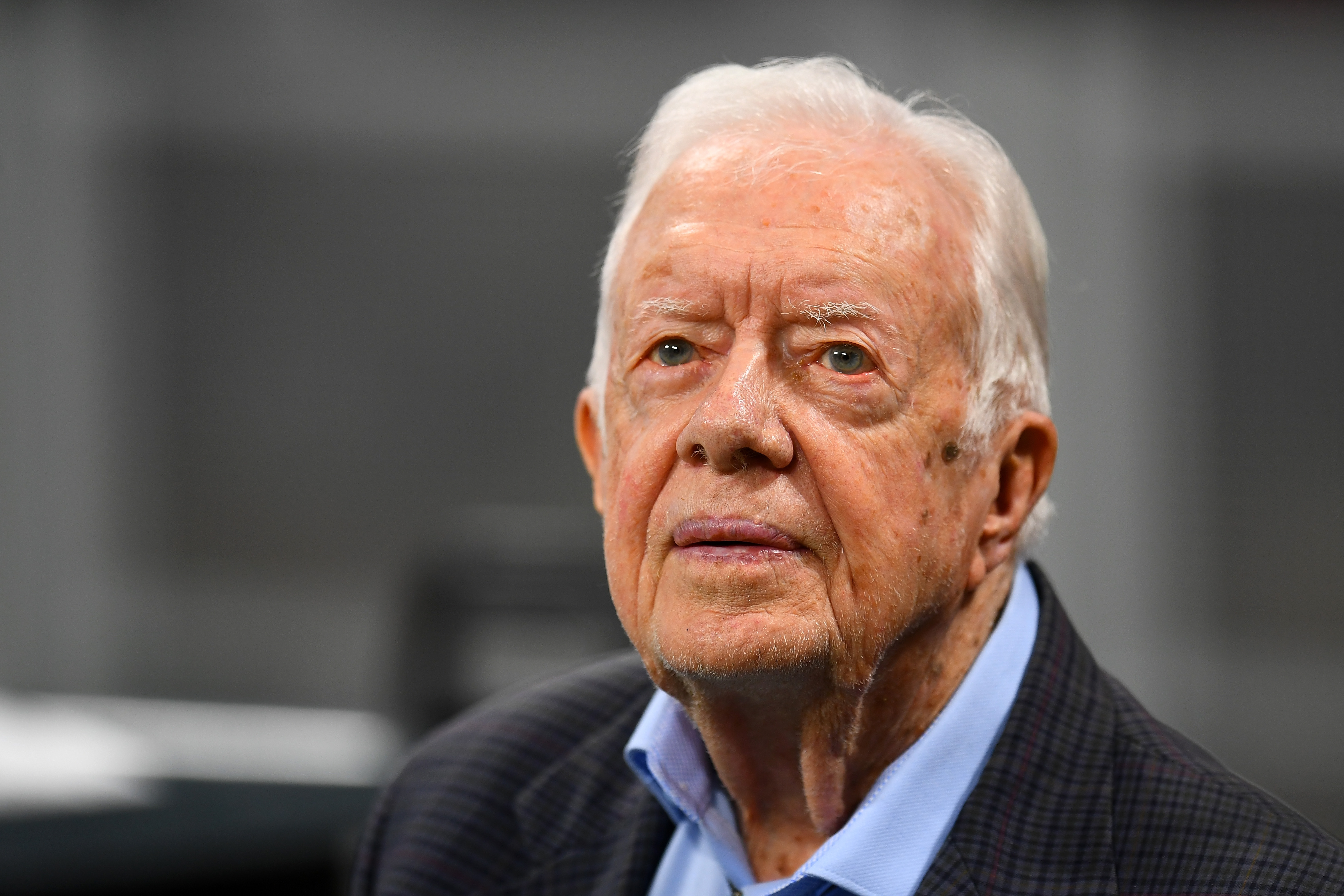 Jimmy Carter watches a game between the Atlanta Falcons and the Cincinnati Bengals on September 30, 2018 | Source: Getty Images