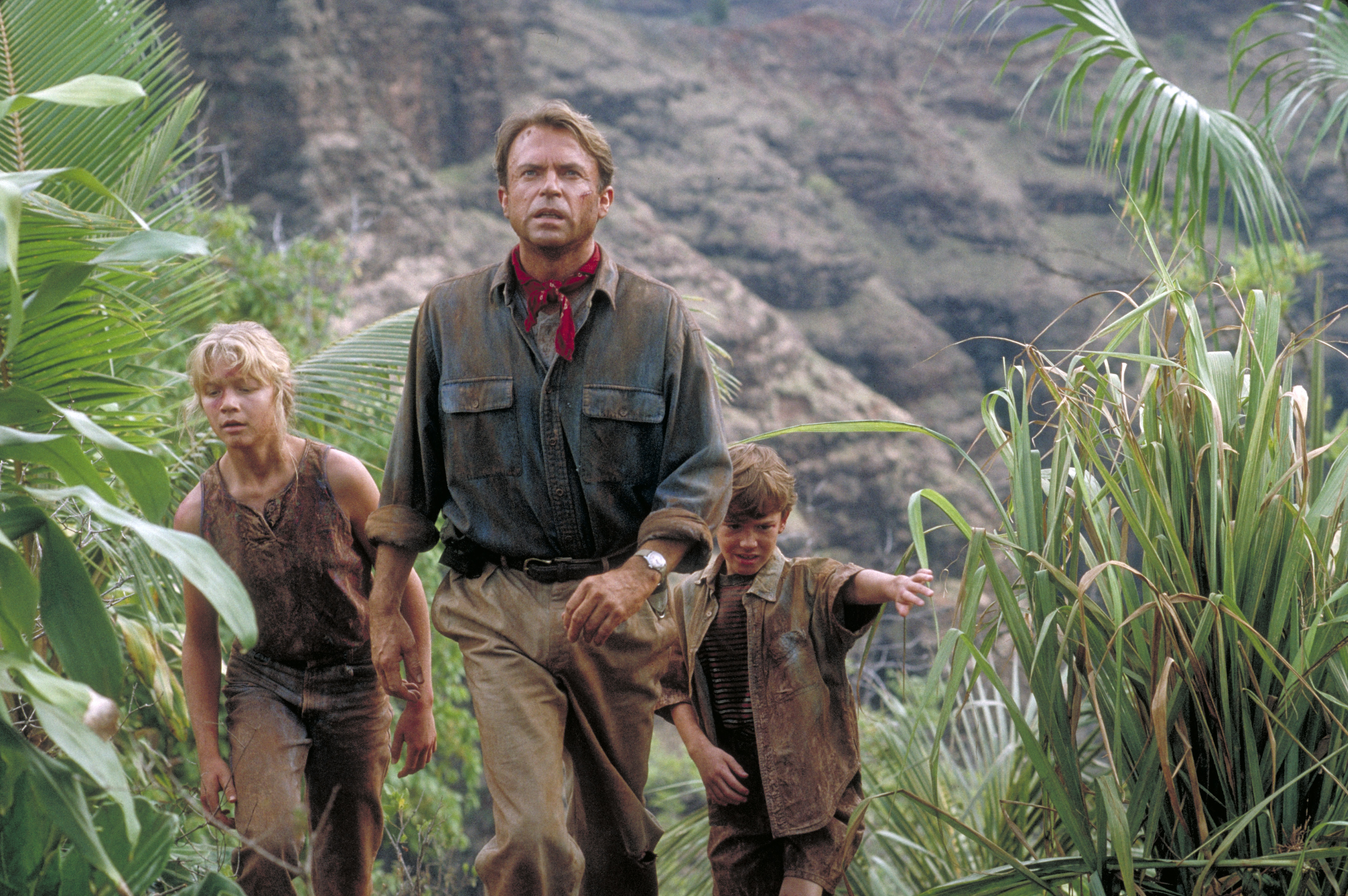 Ariana Richards, Sam Neill and Joseph Mazzello in the set of "Jurassic Park," in 1993. | Source: Getty Images