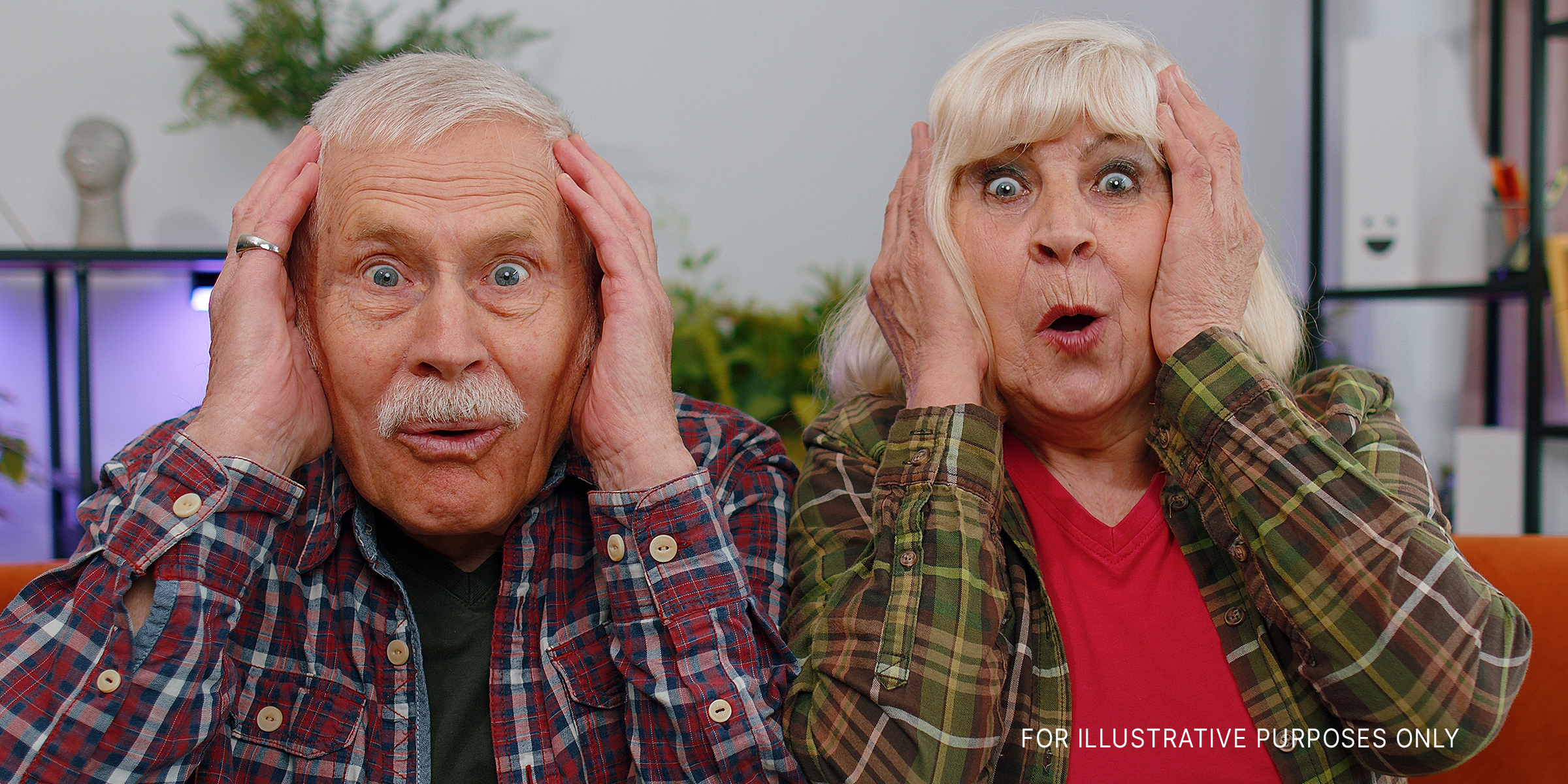 A shocked elderly couple | Source: Shutterstock
