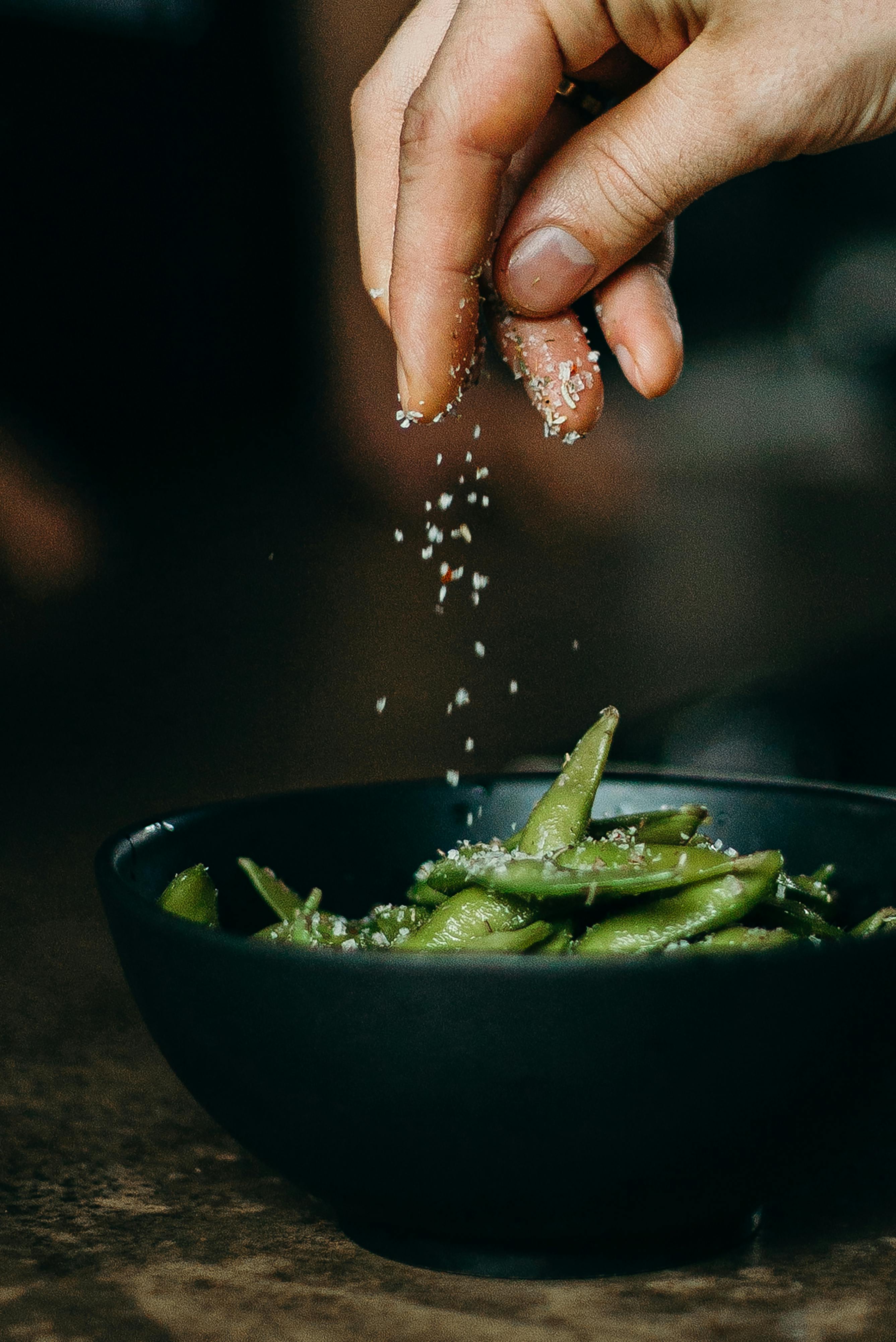 Seasoning the food | Source: Pexels