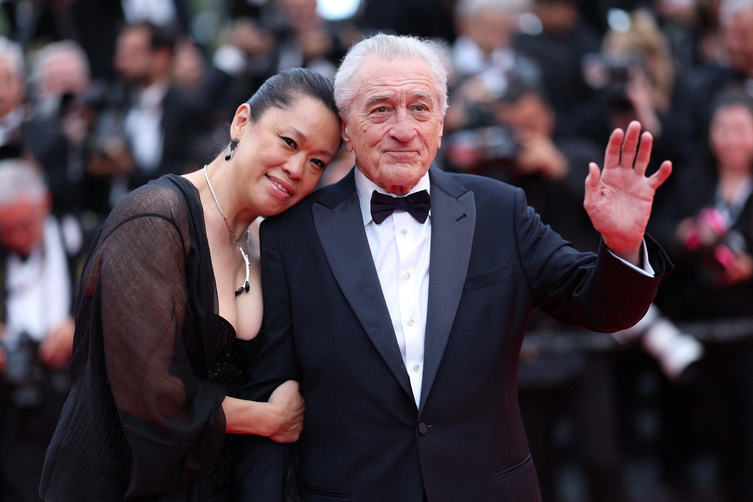 Robert De Niro and Tiffany Chen attend the red carpet at the 78th annual Cannes Film Festival at Palais des Festivals on May 13, 2025, in France | Source: Getty Images