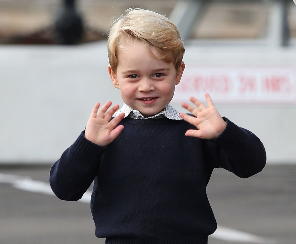 Prince George waves as he leaves from Victoria Harbour to board a sea-plane on the final day of their Royal Tour of Canada on October 1, 2016 | Photo: Getty Images