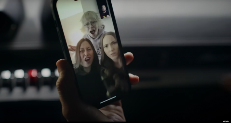 Alaina and Stevie Mathers with Hailie Jade Scott, seen on a FaceTime with their dad, Eminem, posted on May 31, 2024 | Source: YouTube/EminemMusic