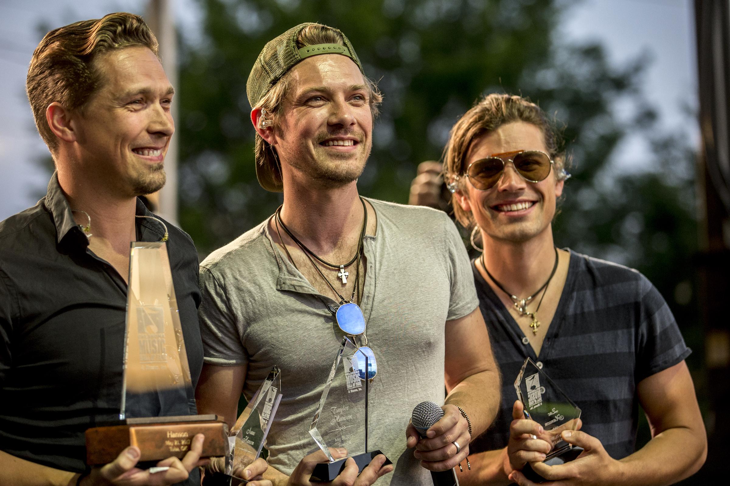 The Hanson brothers during their festival, Hop Jam, in Tulsa, Oklahoma on May 21, 2017. | Source: Getty Images