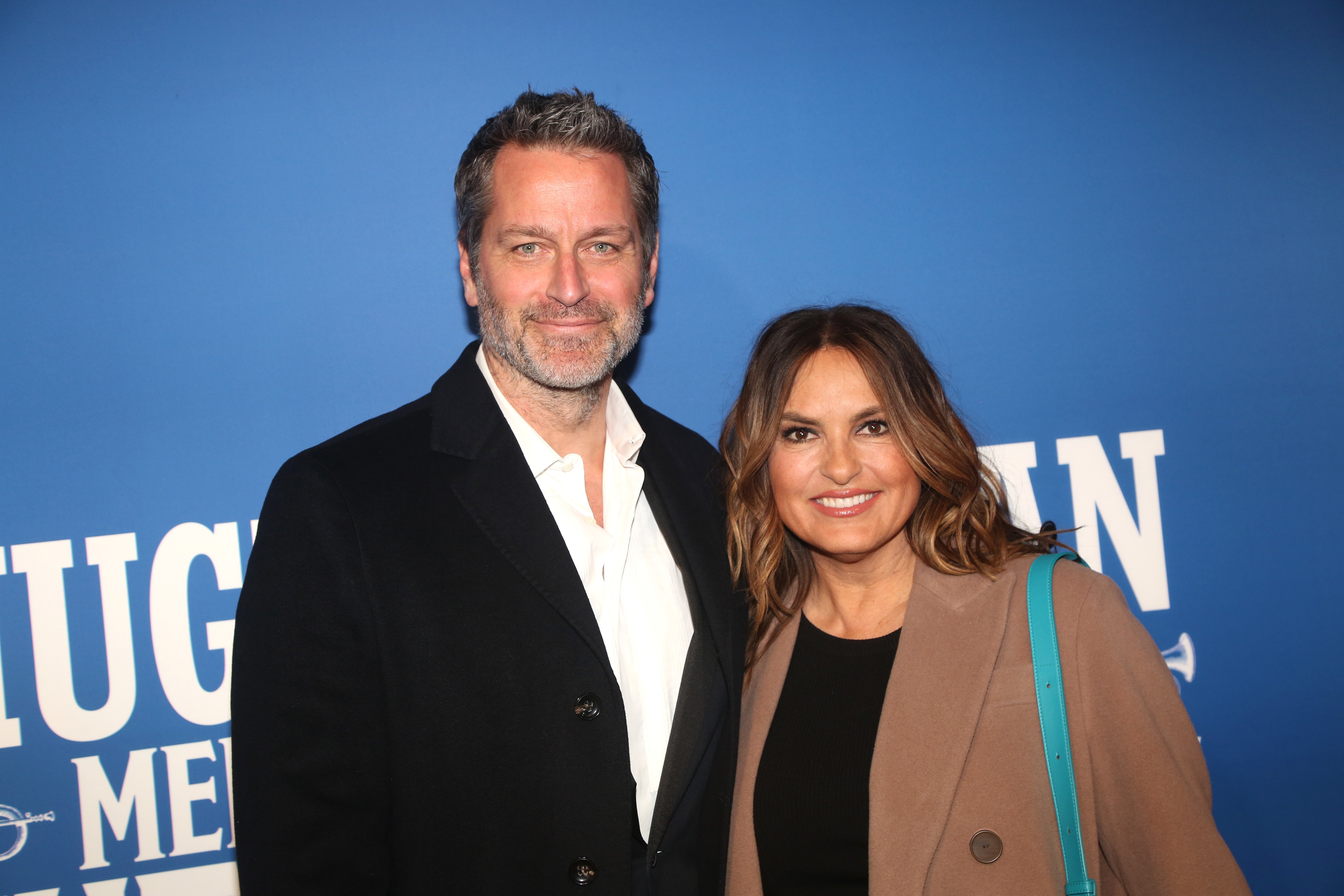 Peter Hermann and Mariska Hargitay pose at the opening night of "The Music Man" at Winter Garden Theatre on February 10, 2022, in New York | Photo: Getty Images