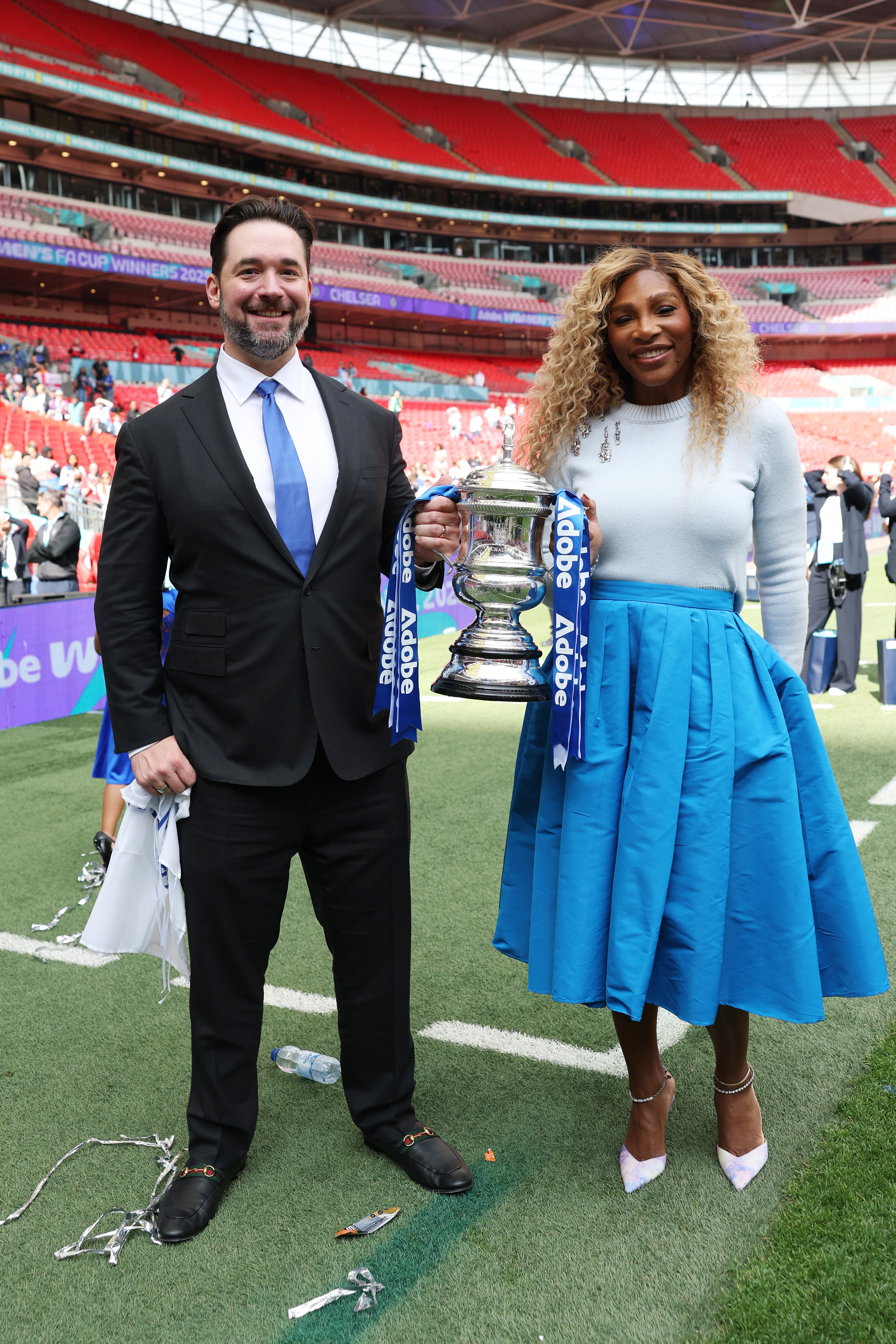 Alexis Ohanian and Serena Williams, pose with the Adobe Women's FA Cup trophy after Chelsea's victory over Manchester United at Wembley Stadium in London on May 18, 2025. | Source: Getty Images