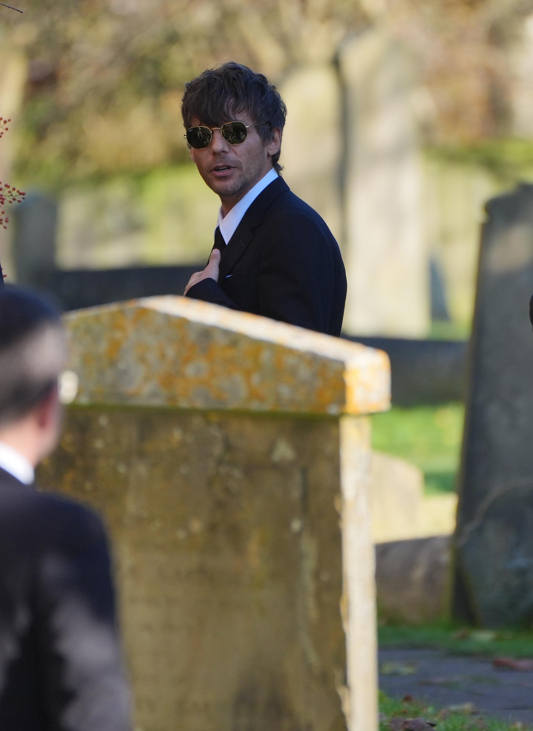 Louis Tomlinson attends Liam Payne's funeral at St. Mary's Church in Amersham on November 20, 2024 | Source: Getty Images