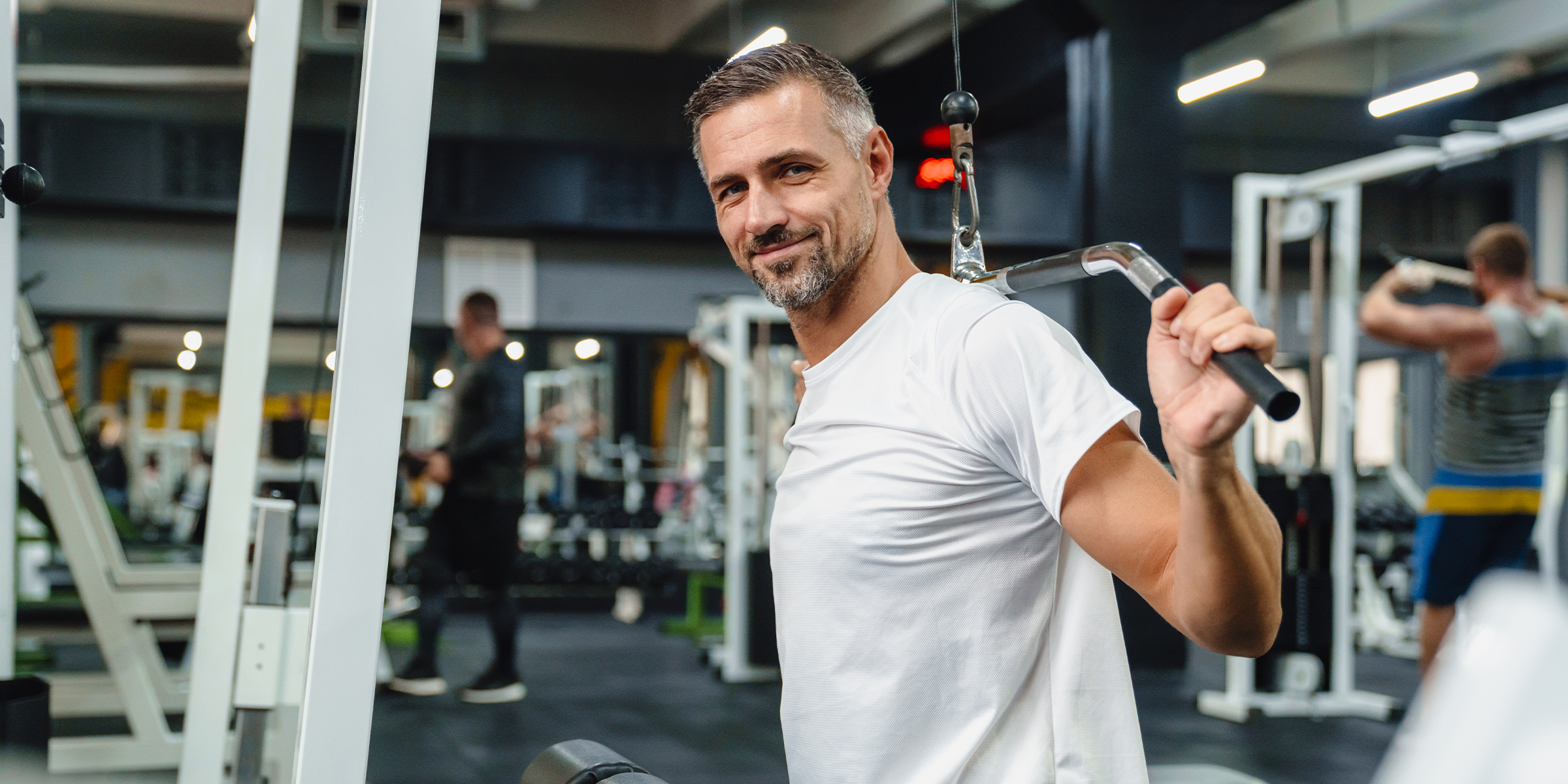 Man working out in a gym | Source: Shutterstock