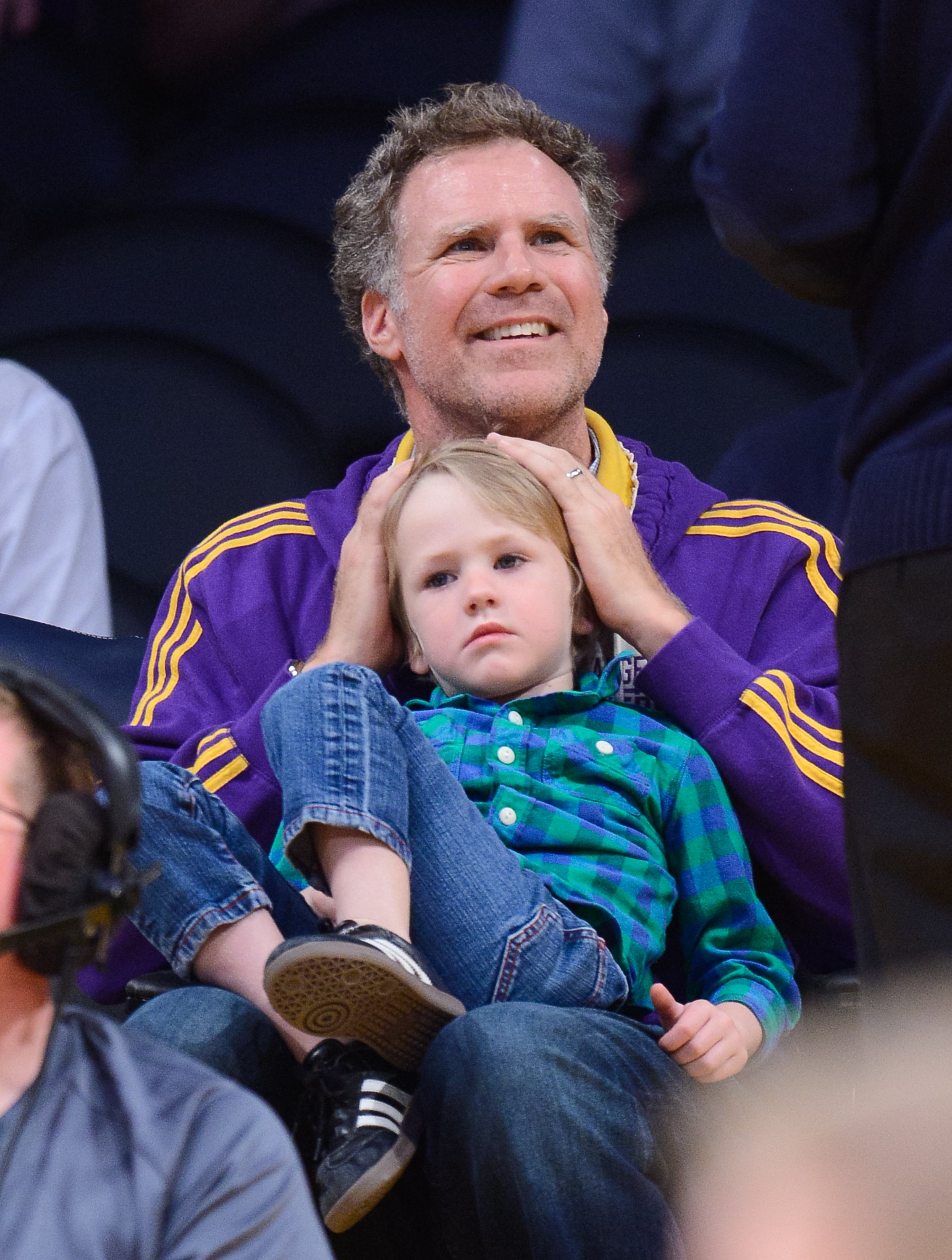 Will Ferrell and his son Axel Ferrell watch a basketball game between the Brooklyn Nets and the Los Angeles Lakers at Staples Center on February 23, 2014, in Los Angeles, California. | Source: Getty Images