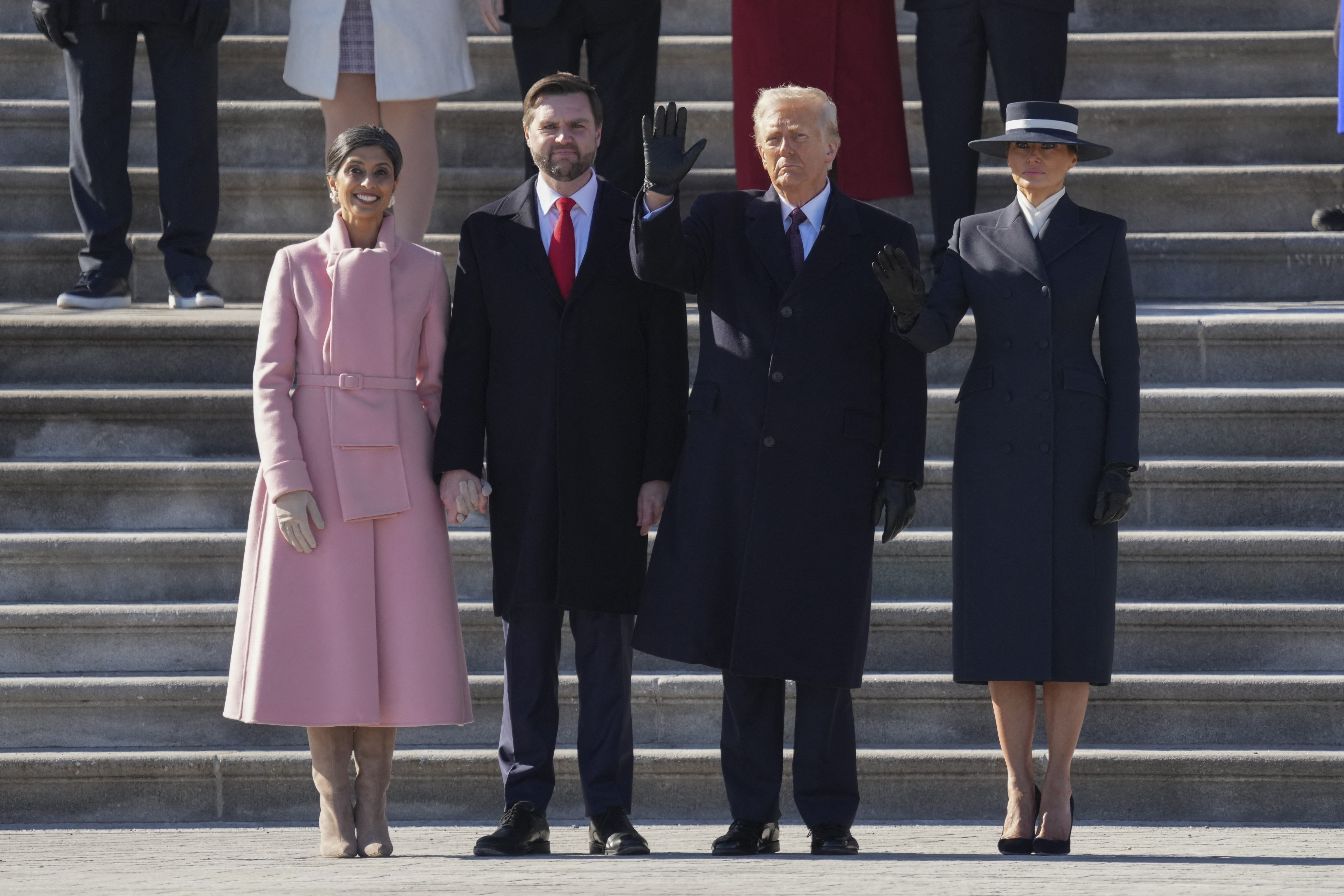 Second Lady Usha Vance, Vice President JD Vance, President Donald Trump and First Lady Melania Trump posing on the Capitol steps. | Source: Getty Images