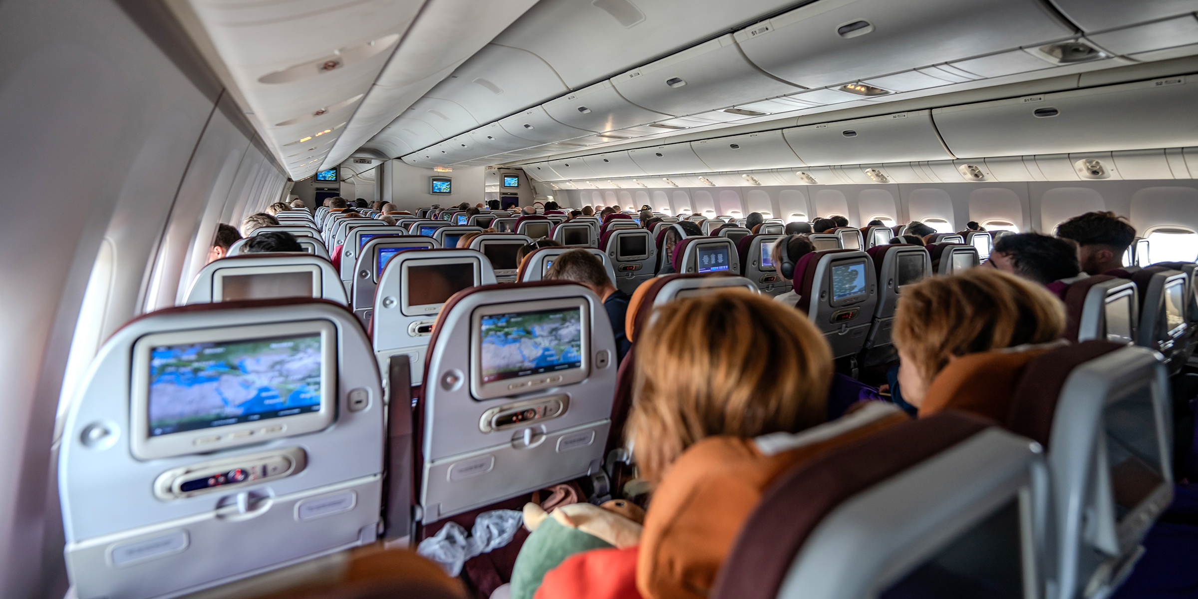 People on a flight | Source: Shutterstock