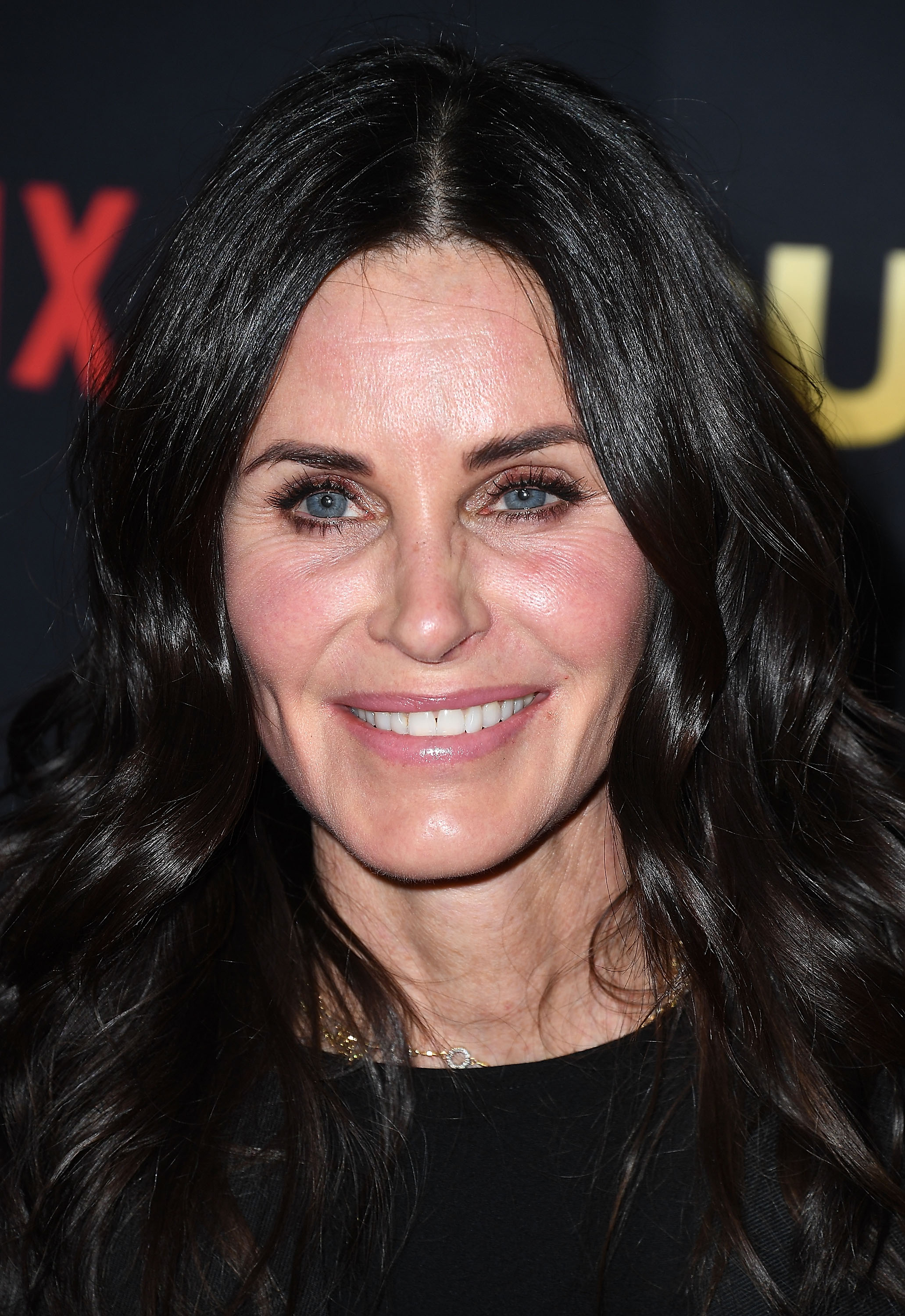 Courtney Cox arrives at the premiere of Netflix's "Dumplin'" at TCL Chinese 6 Theatres in Hollywood, California on December 6, 2018. | Source: Getty Images