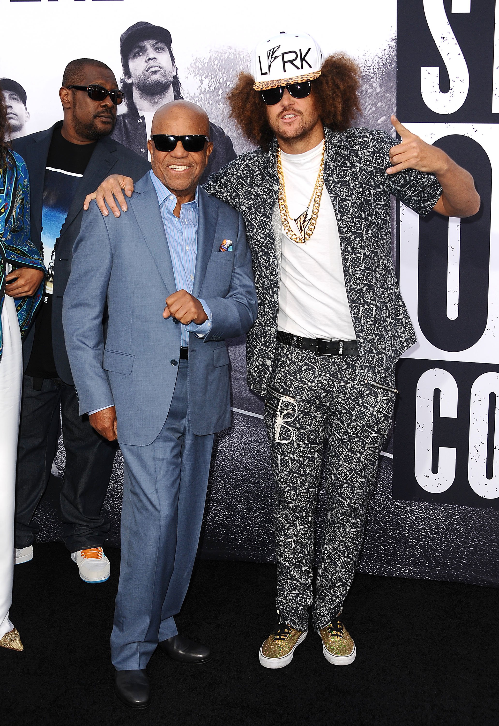 Berry Gordy and Stefan Kendal ‘Redfoo’ Gordy at the premiere of "Straight Outta Compton" on August 10, 2015, in California | Source: Getty Images 