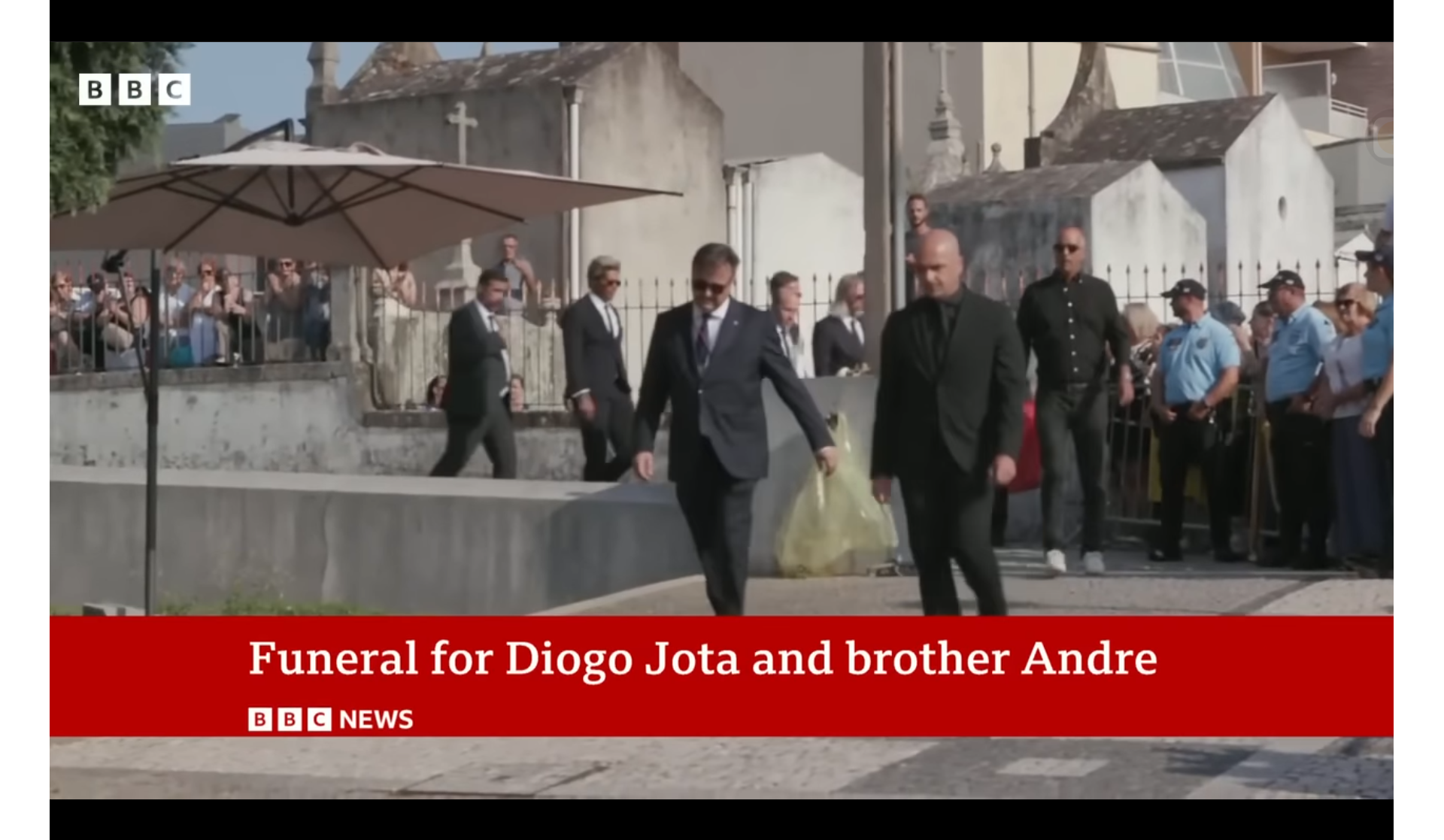 Roberto Martinez, dressed in an all black attire, attends the funeral service of Diogo Jota and his brother, André Silva | Source: YouTube/bbcnews