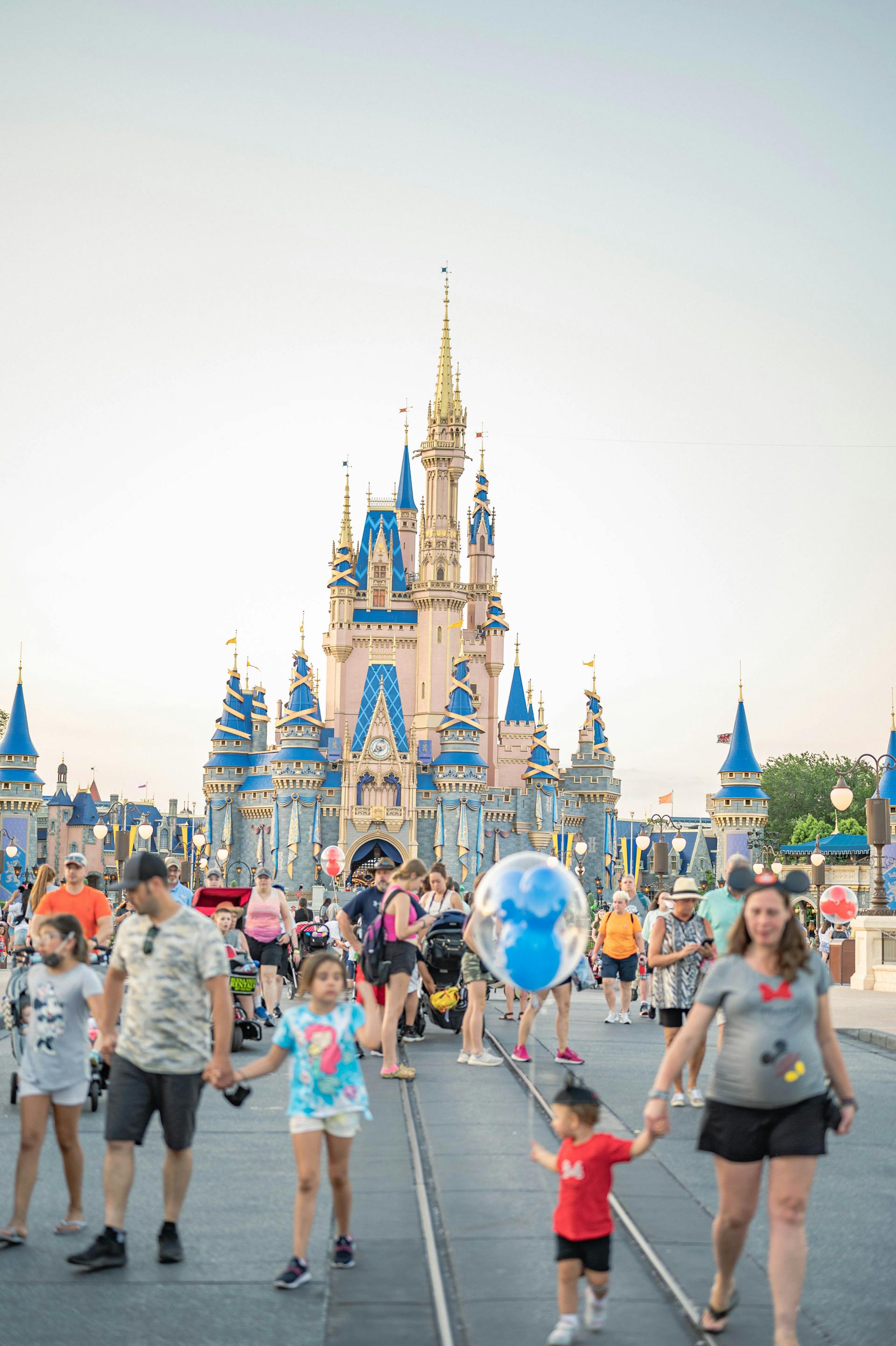 People walking near a Disney castle | Source: Pexels