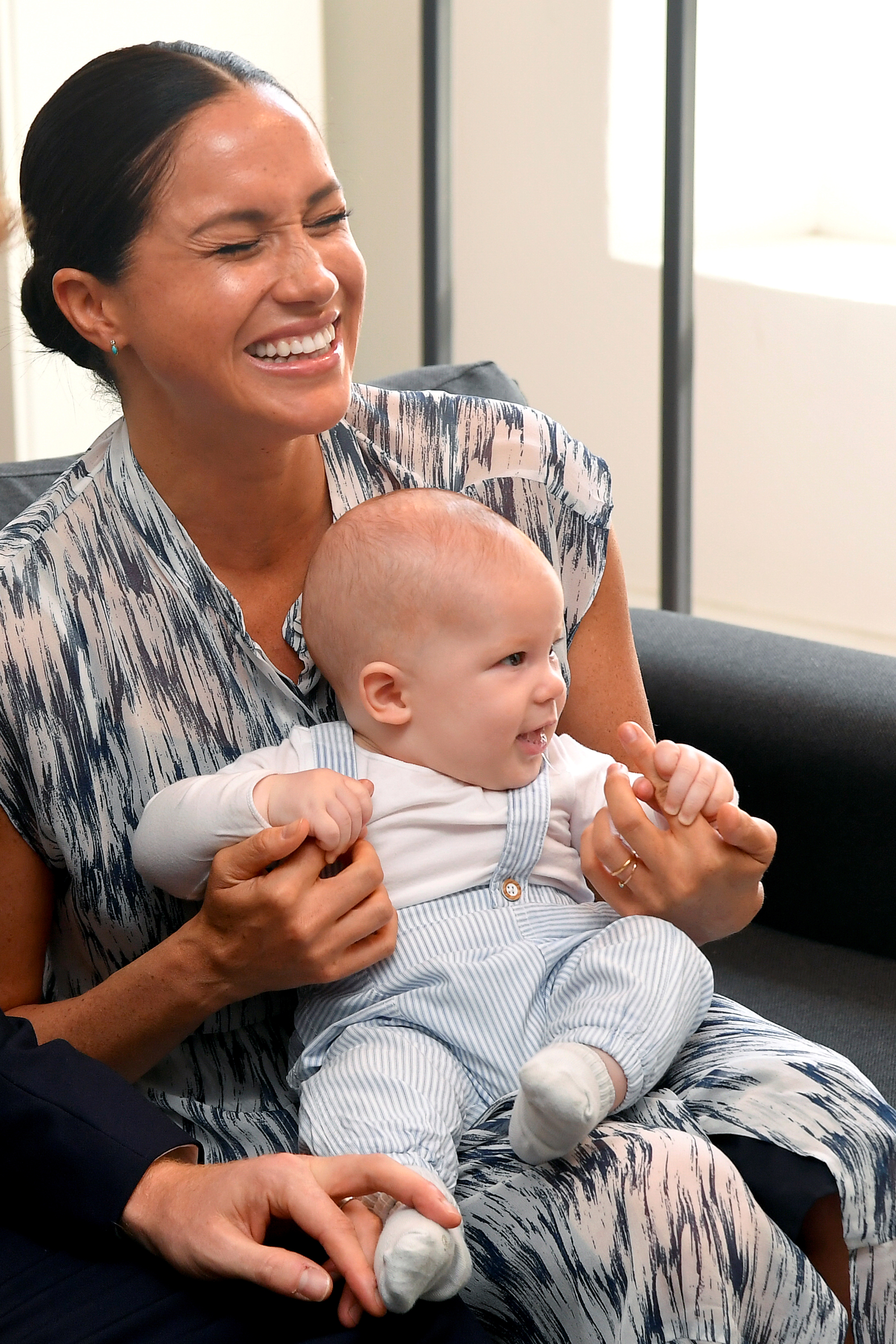 Meghan, Duchess of Sussex laughs as she holds Archie Mountbatten-Windsor at a meeting with Archbishop Desmond Tutu in Cape Town, South Africa, on September 25, 2019. | Source: Getty Images