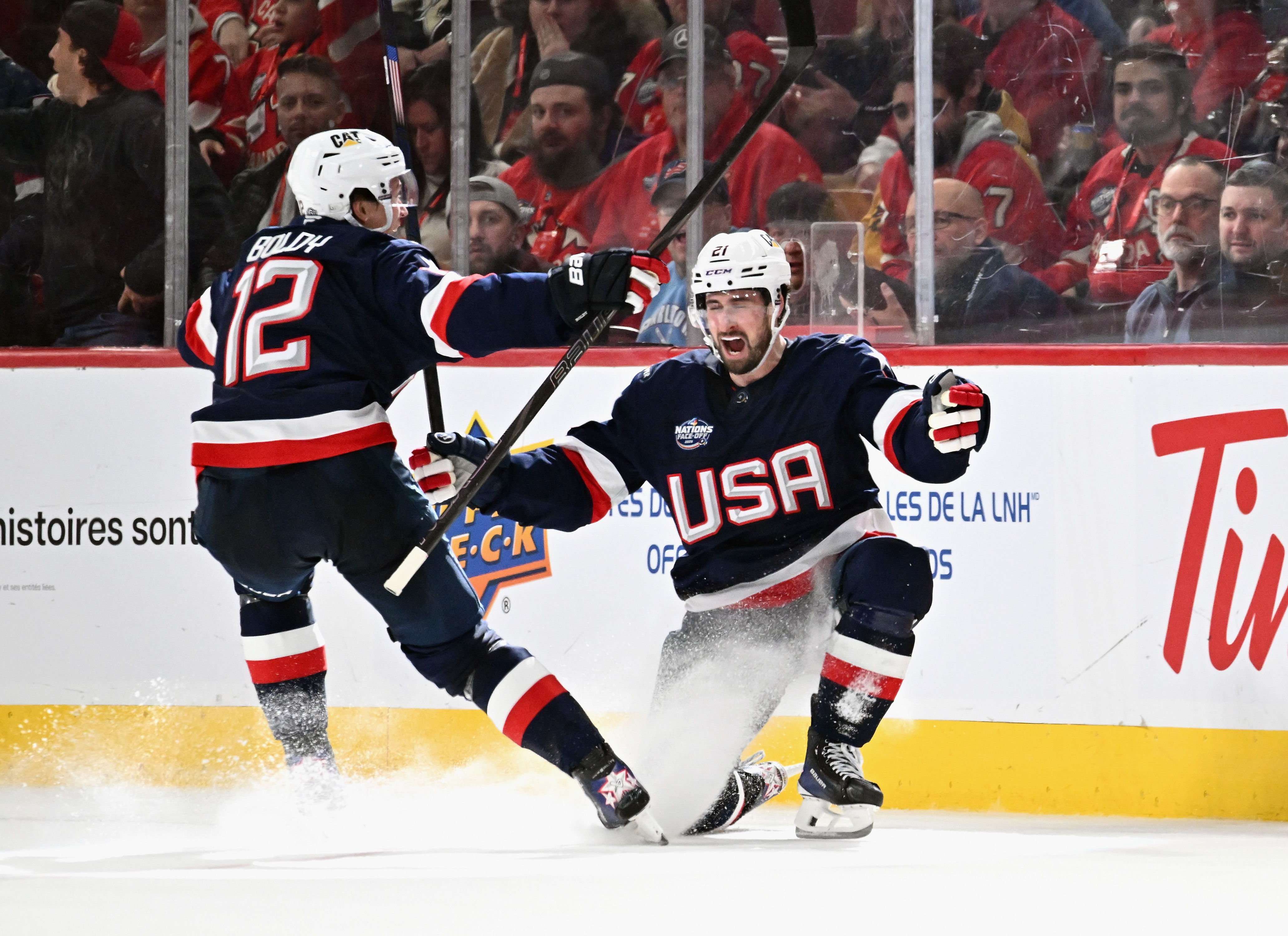 Dylan Larkin #21 of Team USA celebrates his goal against Team Canada at 13:33 of the second period on an assist from Matt Boldy #12 of Team USA (l) in the 4 Nations Face-Off game at the Bell Centre on February 15, 2025, in Montreal, Quebec, Canada | Source: Getty Images