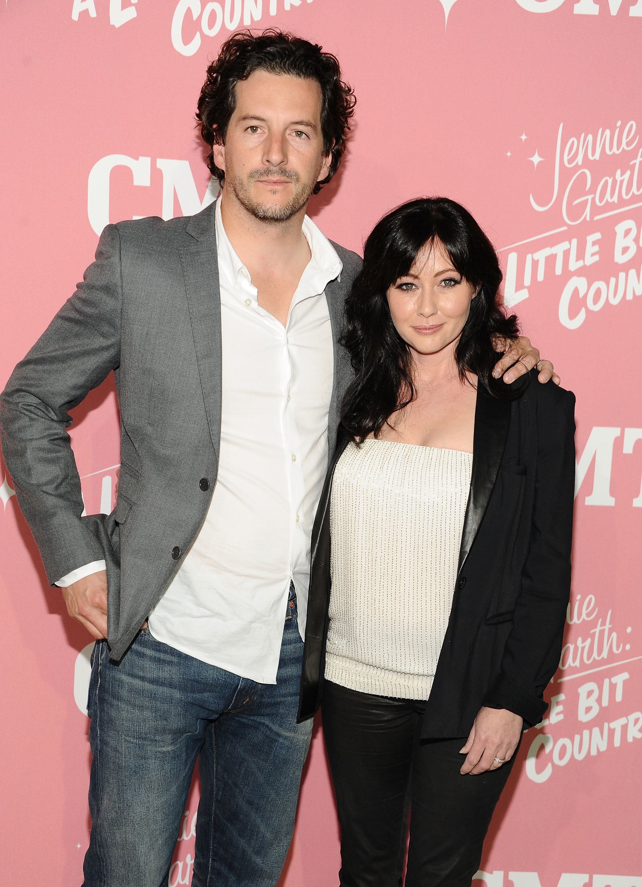 Kurt Iswarienko and Shannen Doherty at Jennie Garth's 40th birthday celebration and premiere party for "Jennie Garth: A Little Bit Country" at The London Hotel in West Hollywood, California on April 19, 2012. | Source: Getty Images