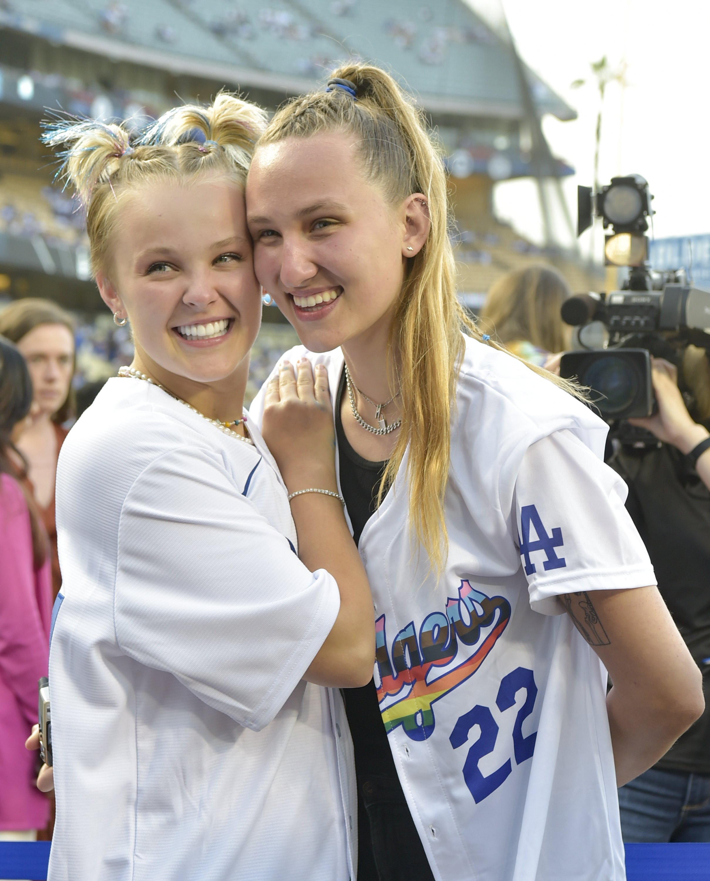 Jojo Siwa and her girlfriend Kylie Prew at the 9th Annual LGBTQ+ Night at Dodger Stadium at Dodger Stadium, in 2022, in Los Angeles. | Source: Getty Images
