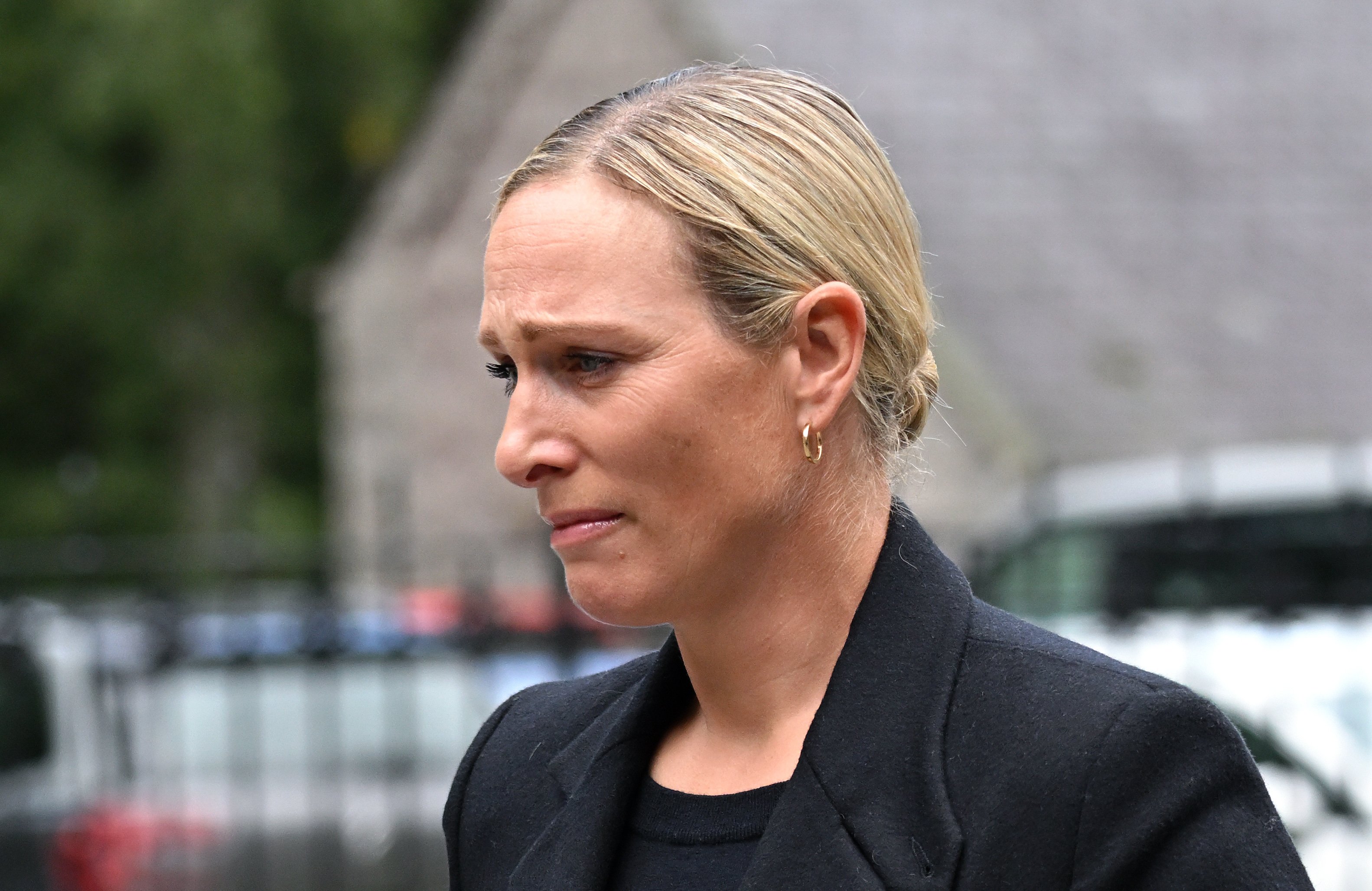 Zara Phillips looks tearful outside the gates of Balmoral Castle on September 10, 2022 in Aberdeen, Scotland | Source: Getty Images