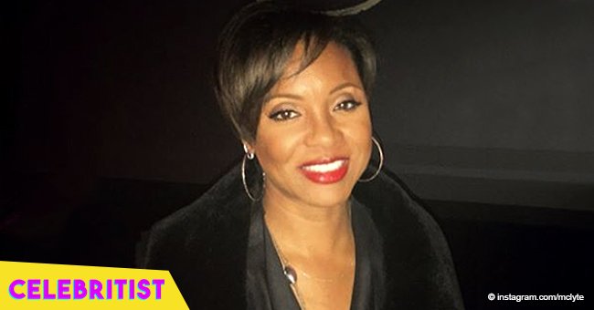 MC Lyte flashes major leg in intricately styled dress with thigh-high slit