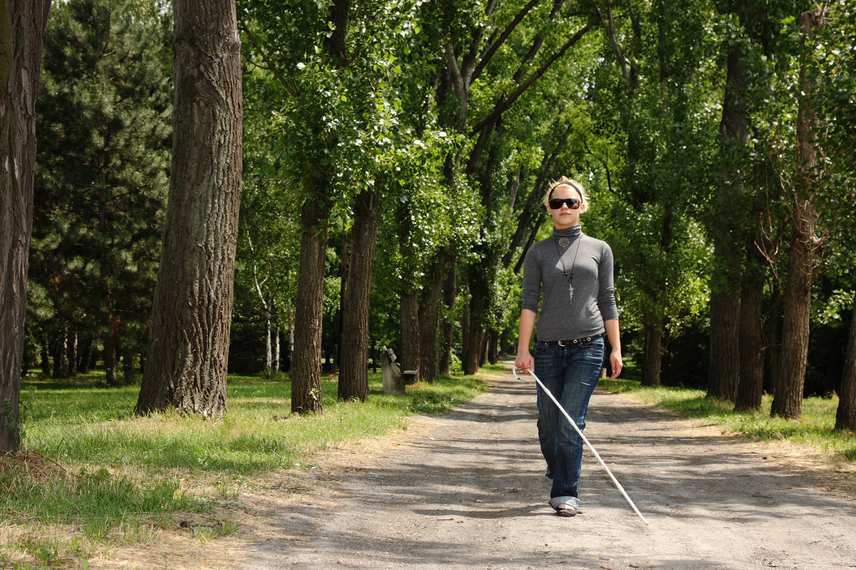 Blind Girl Walking In A Park | Source: Shutterstock
