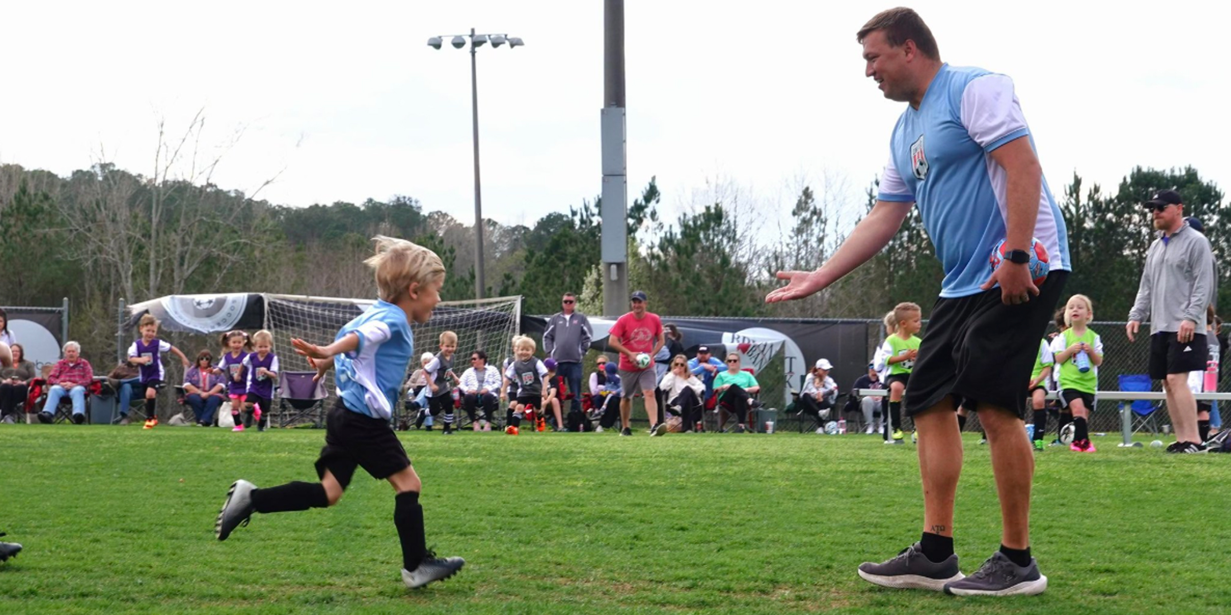 Drew Owen and his son playing soccer | Source: Facebook/drew.owen
