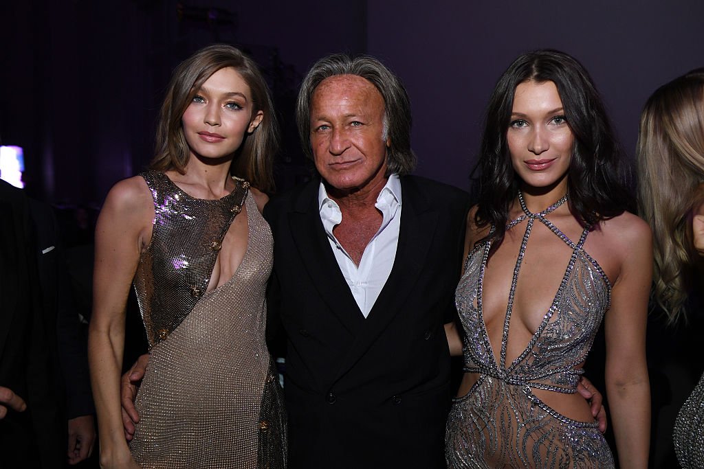 Gigi Hadid, Mohamed Hadid and Bella Hadid attend the Victoria's Secret After Party at the Grand Palais on November 30, 2016 in Paris, France. | Photo: Gettymages