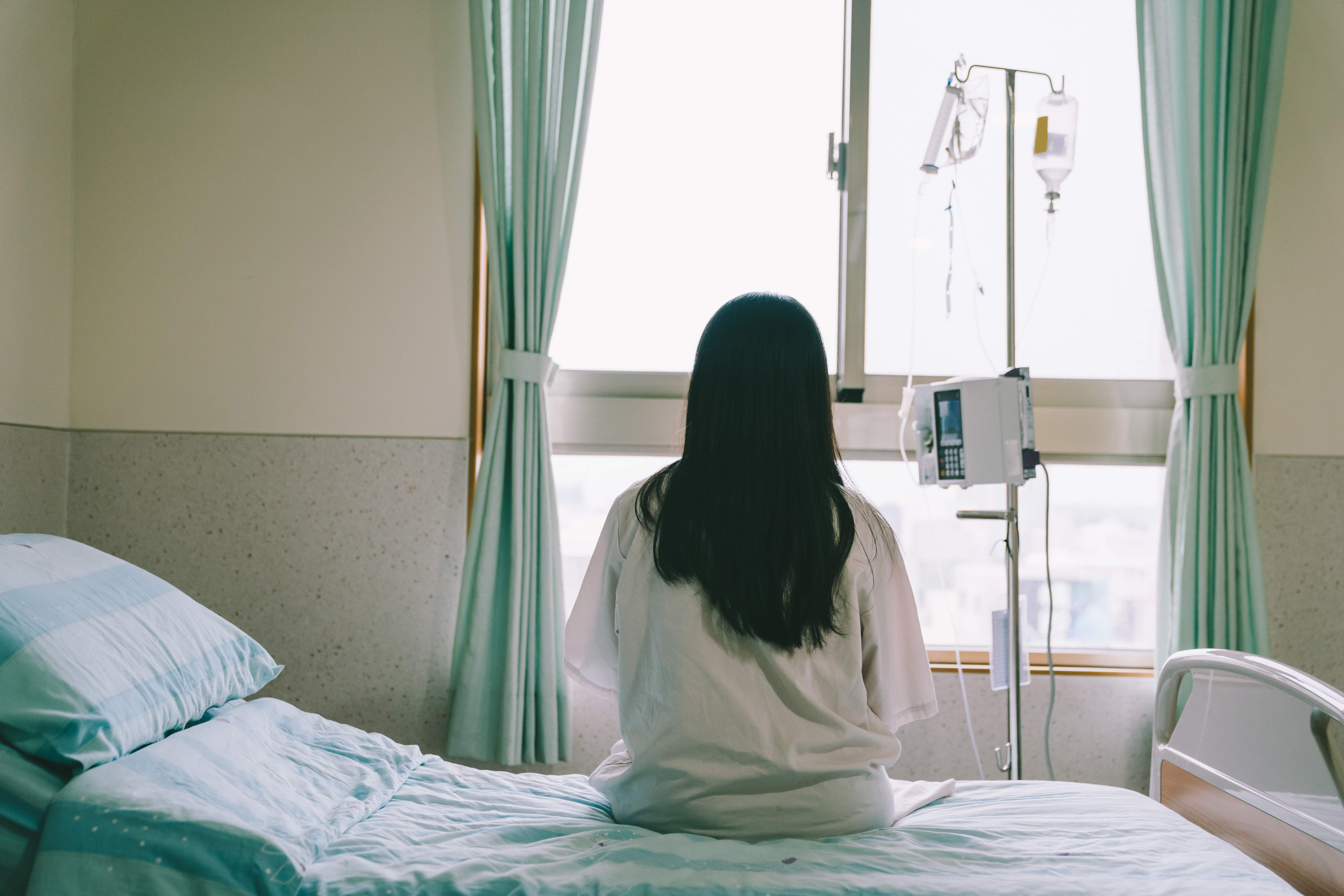 Back view of female patient | Source: Shutterstock