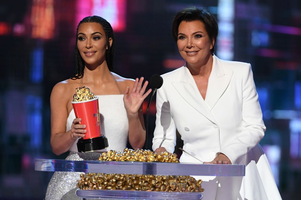 Kim Kardashian and Kris Jenner accept the Best Reality Series or Franchise award for 'Keeping Up with the Kardashians' during the 2018 MTV Movie And TV Awards, June 2018 | Source: Getty Images 