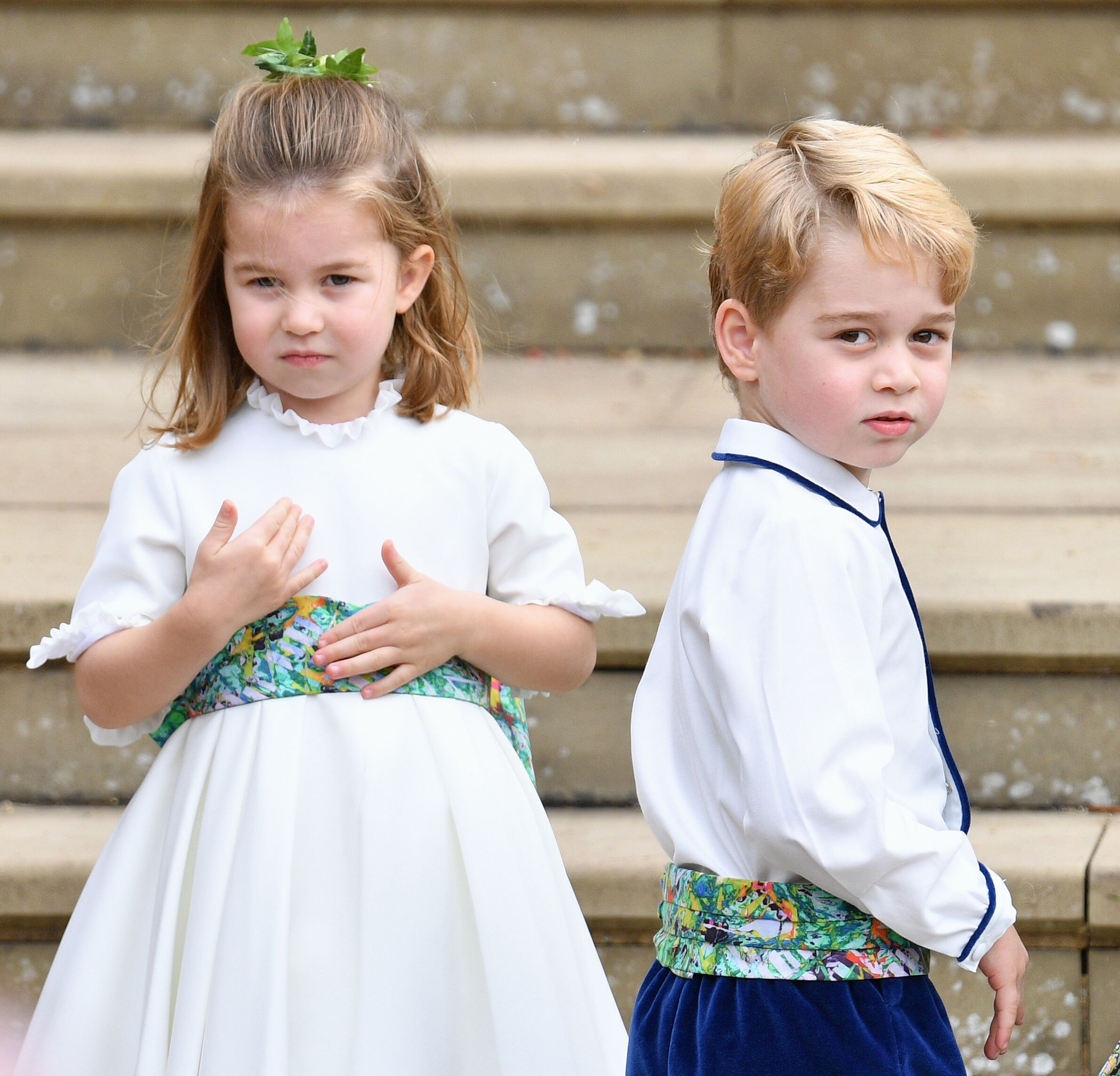 Princess Charlotte of Cambridge and Prince George of Cambridge attend the wedding of Princess Eugenie of York and Jack Brooksbank at St George's Chapel on October 12, 2018 in Windsor, England | Photo: Getty Images