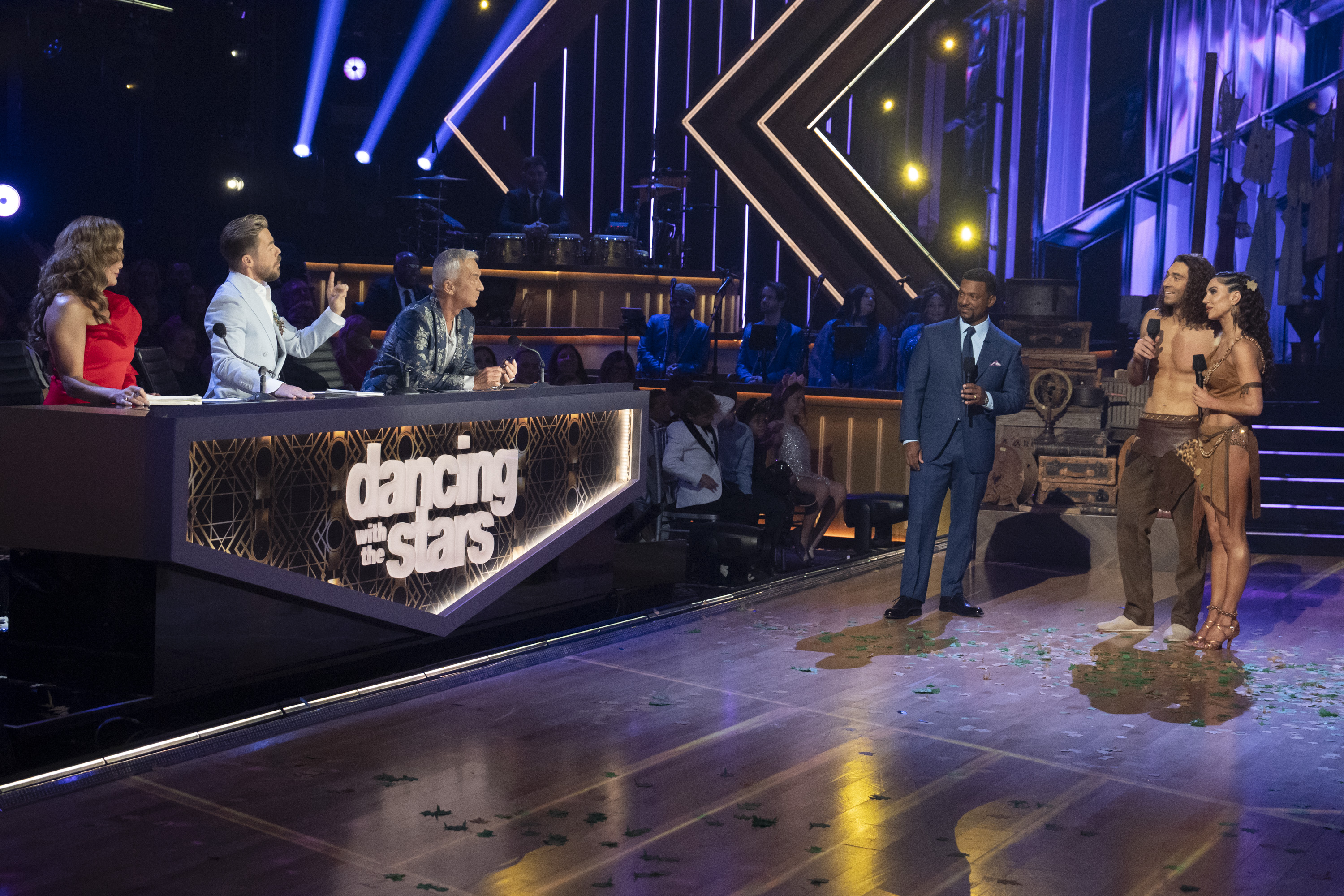 Joey Graziadei and Jenna Johnson receiving feedback from Carrie Ann Inaba, Derek Hough, and Bruno Tonioli with Alfonso Ribeiro. | Source: Getty Images