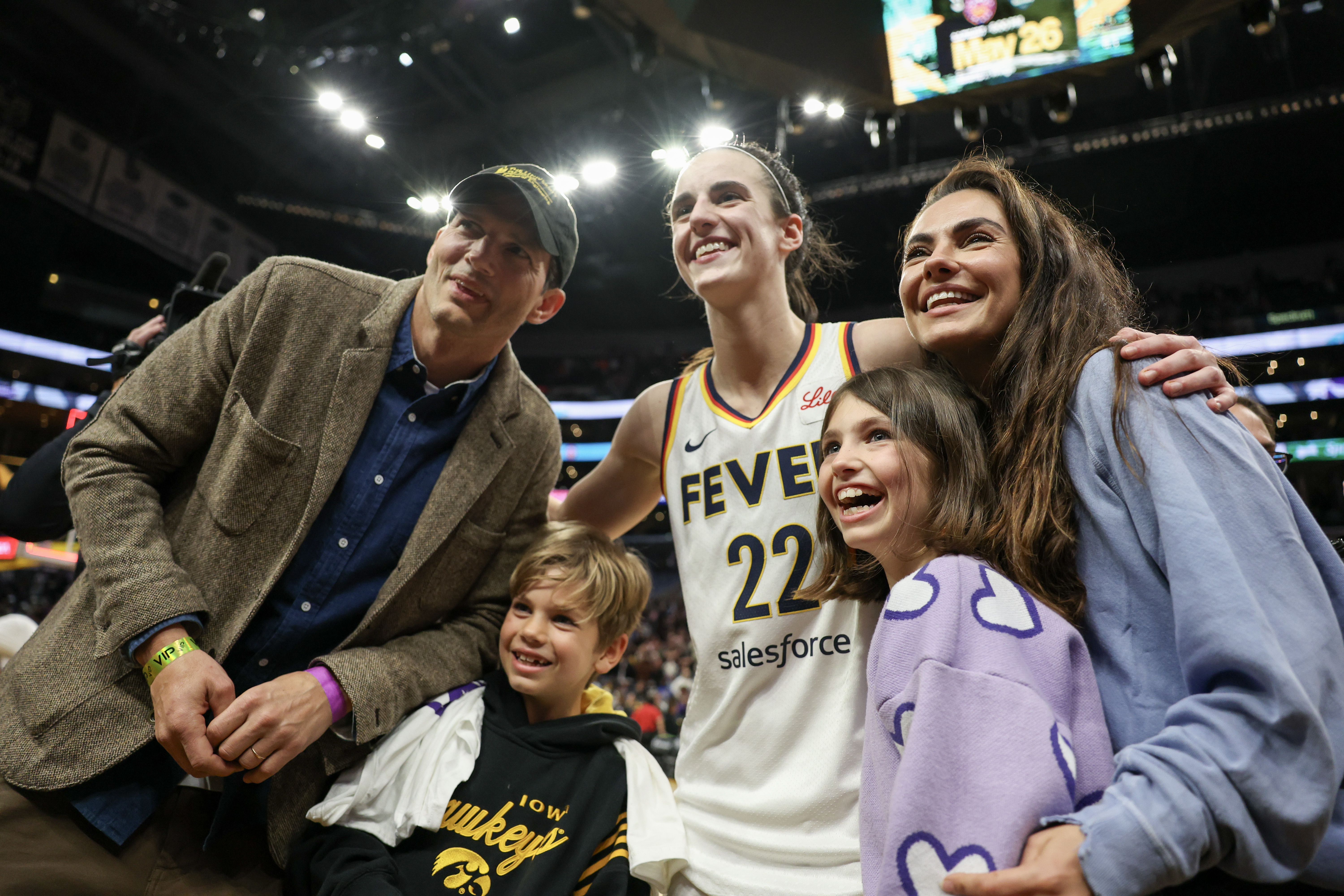Caitlin Clark, Mila Kunis, Ashton Kutcher and their children, Wyatt and Dimitri, during the WNBA basketball game on May 24, 2024, at Crypto.com Arena in Los Angeles, California | Source: Getty Images
