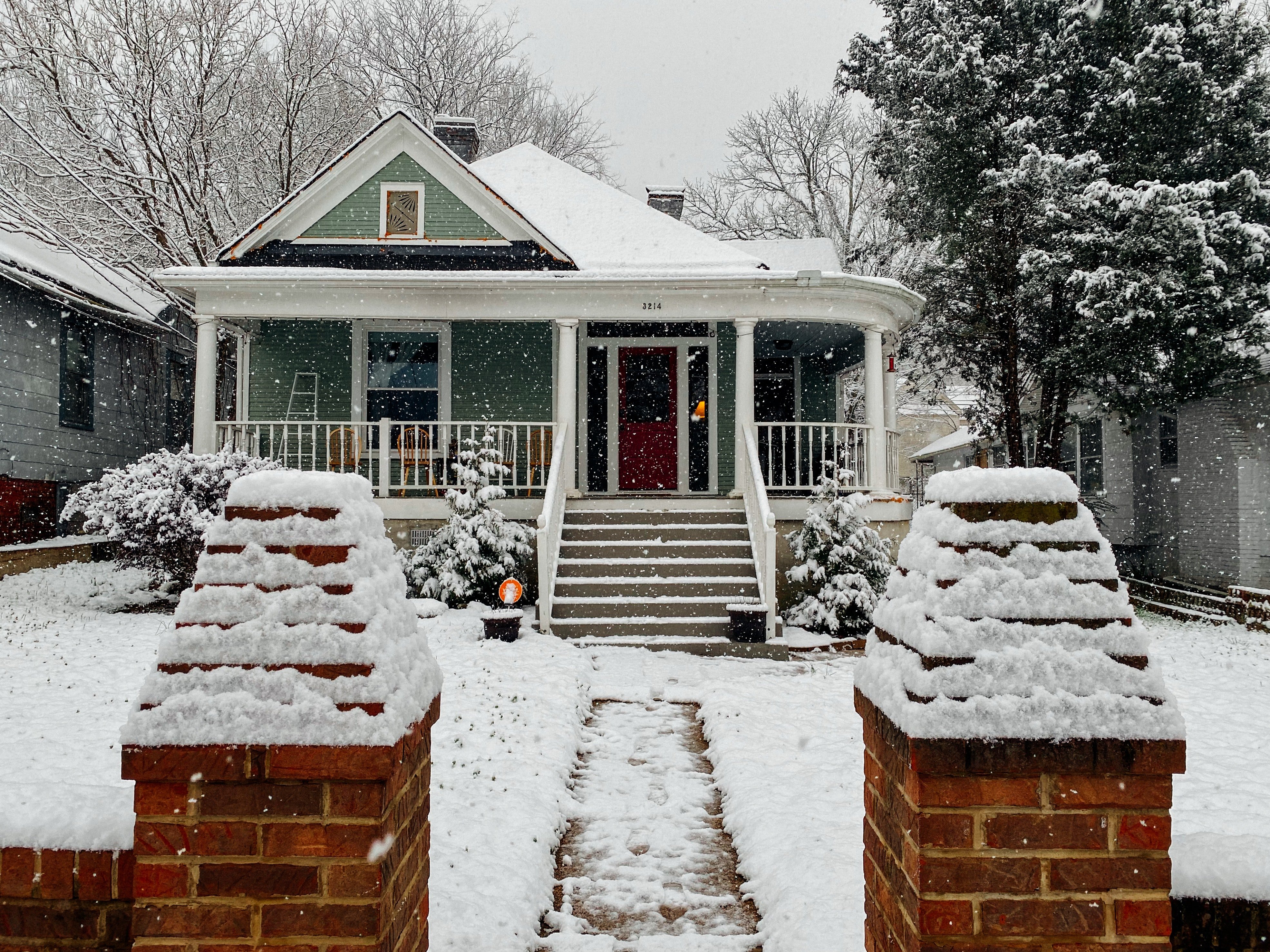 While the boy's house was okay, his neighbor's house ended up covered in snow. | Source: Pexels