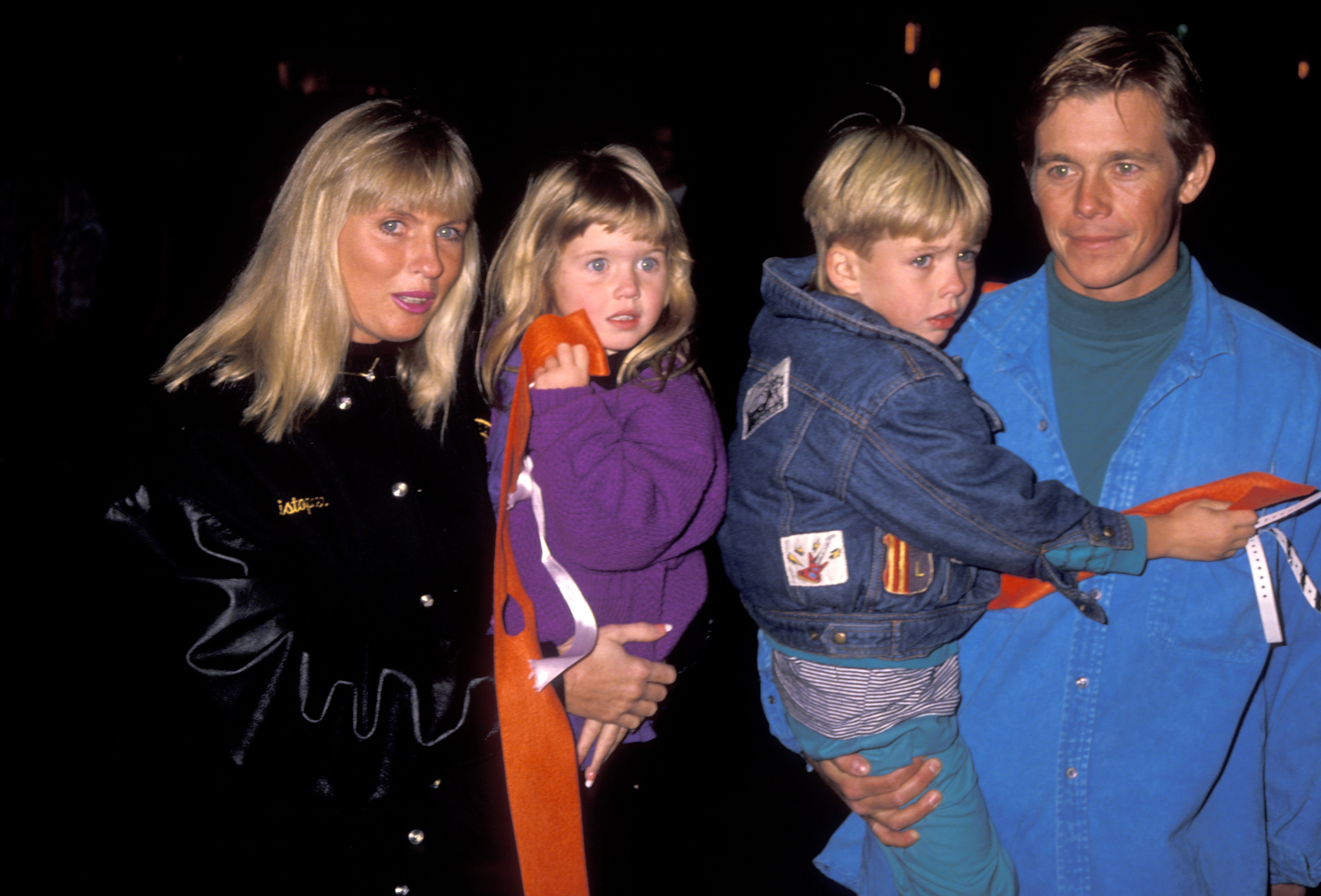 The Hollywood star and his family at the Teenage Mutant Ninja Turtles' "Coming Out of Their Shells" Rock & Roll Tour on November 21, 1990, in Universal City, California. | Source: Getty Images