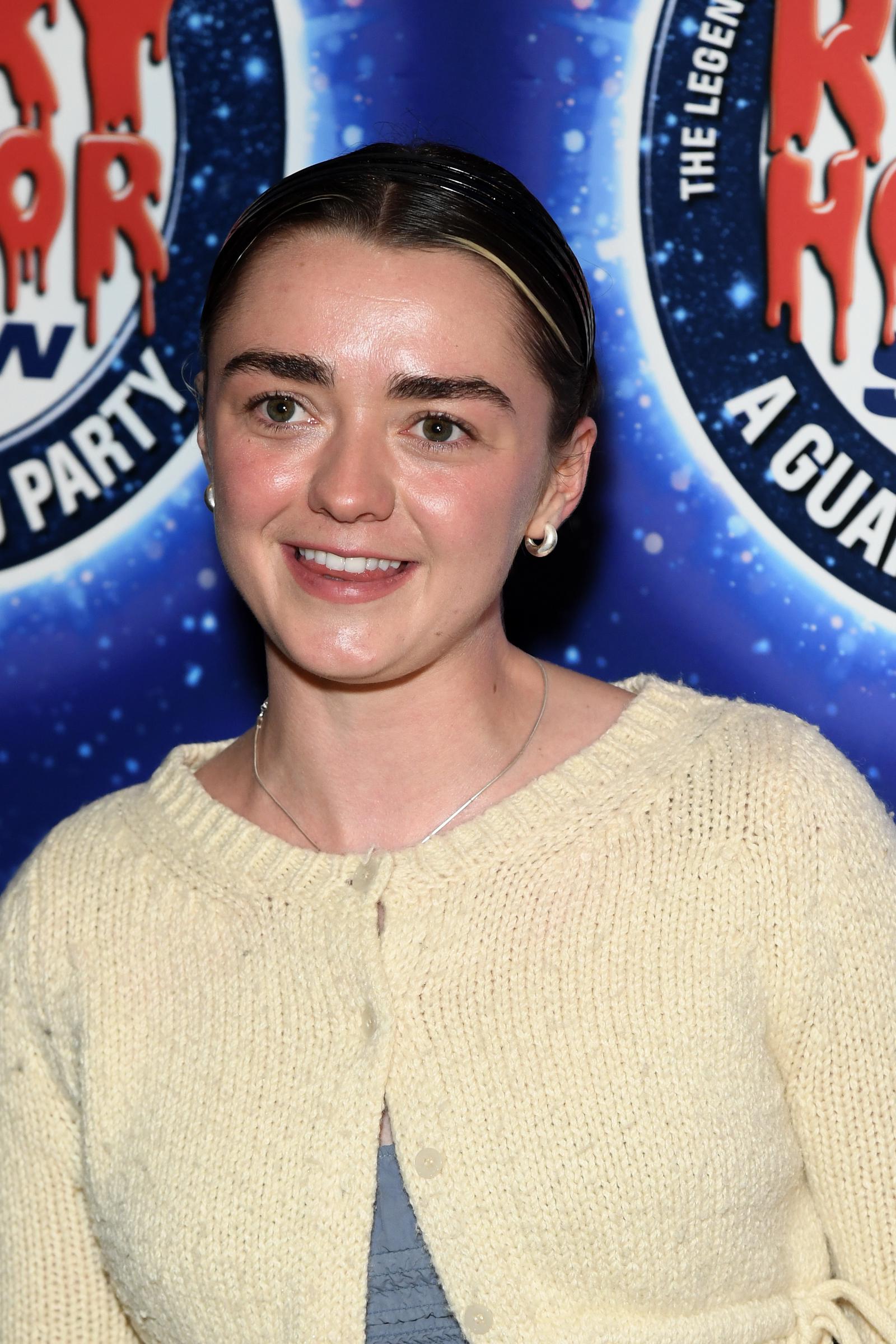 Williams, also 27 in 2024, attended a gala in London with a look that was understated, playful, and refreshingly natural. Wearing a cozy cream cardigan and slicked-back hair, she gave off an effortlessly cool vibe — trading red carpet drama for authenticity and comfort without sacrificing personality.