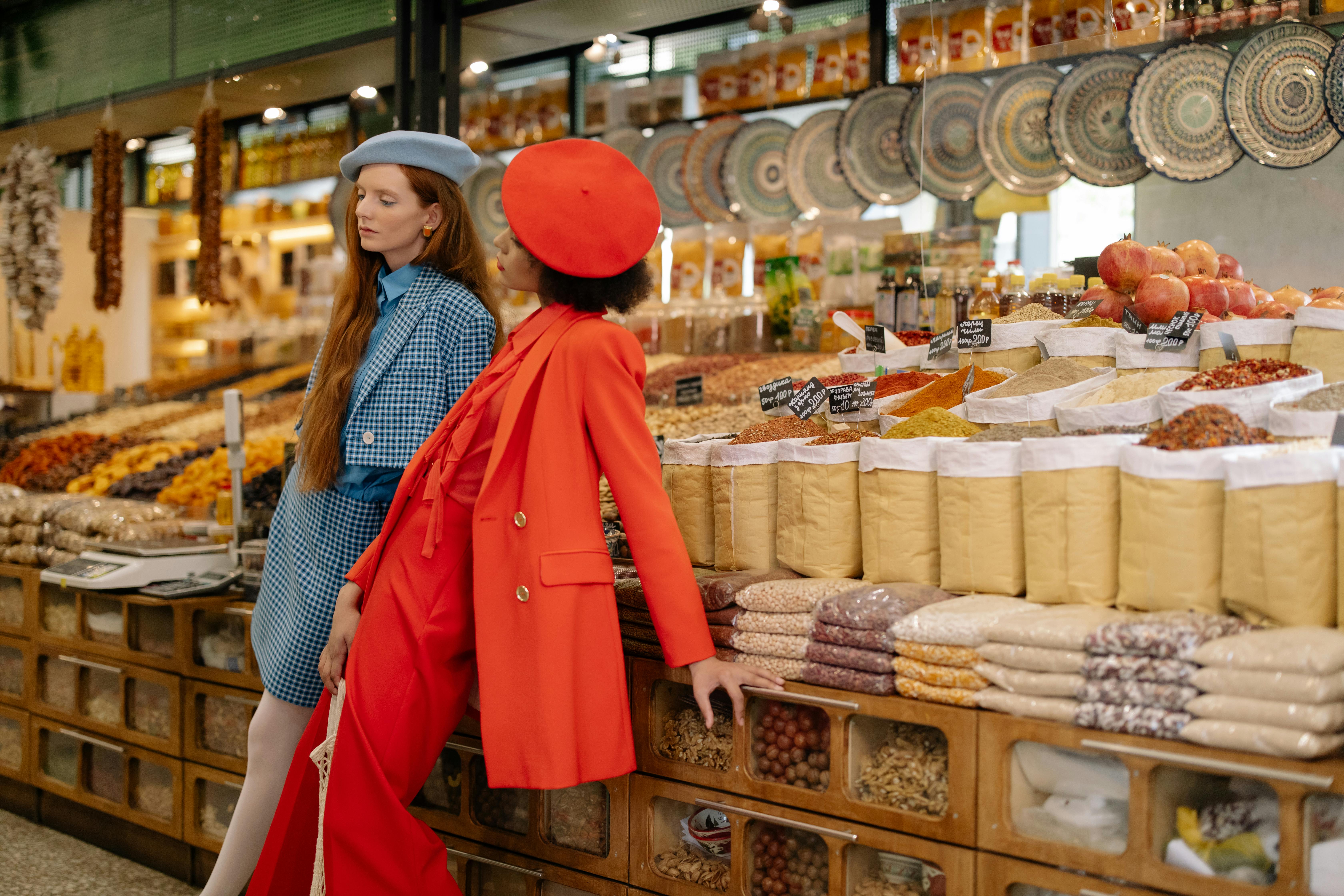 Two women at a grocery store | Source: Pexels