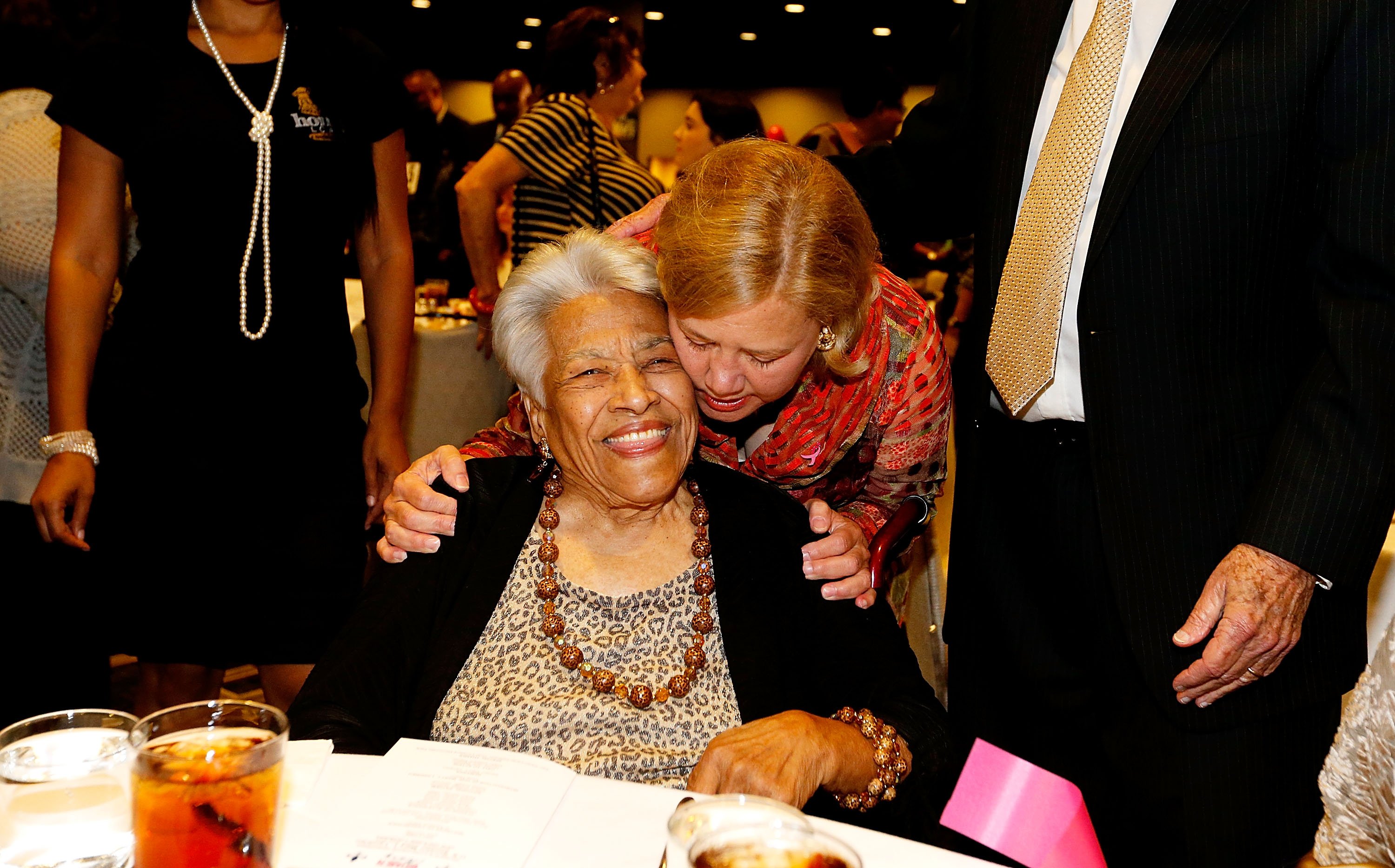 Leah Chase being hugged by U.S. Senator Mary Landrieu at a "Women with Mary" campaign event in New Orleans, Louisiana | Photo: Getty Images 