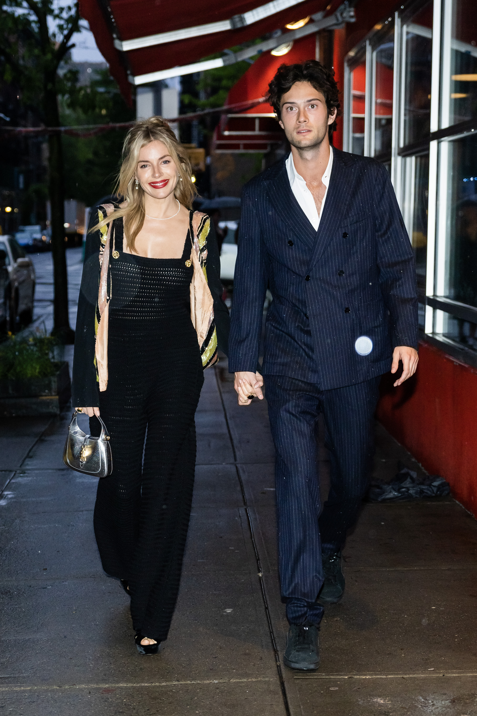 Sienna Miller and Oli Green are seen arriving for a pre-Met Gala dinner hosted by Anna Wintour in SoHo on 30 April 2023 in New York City. | Source: Getty Images
