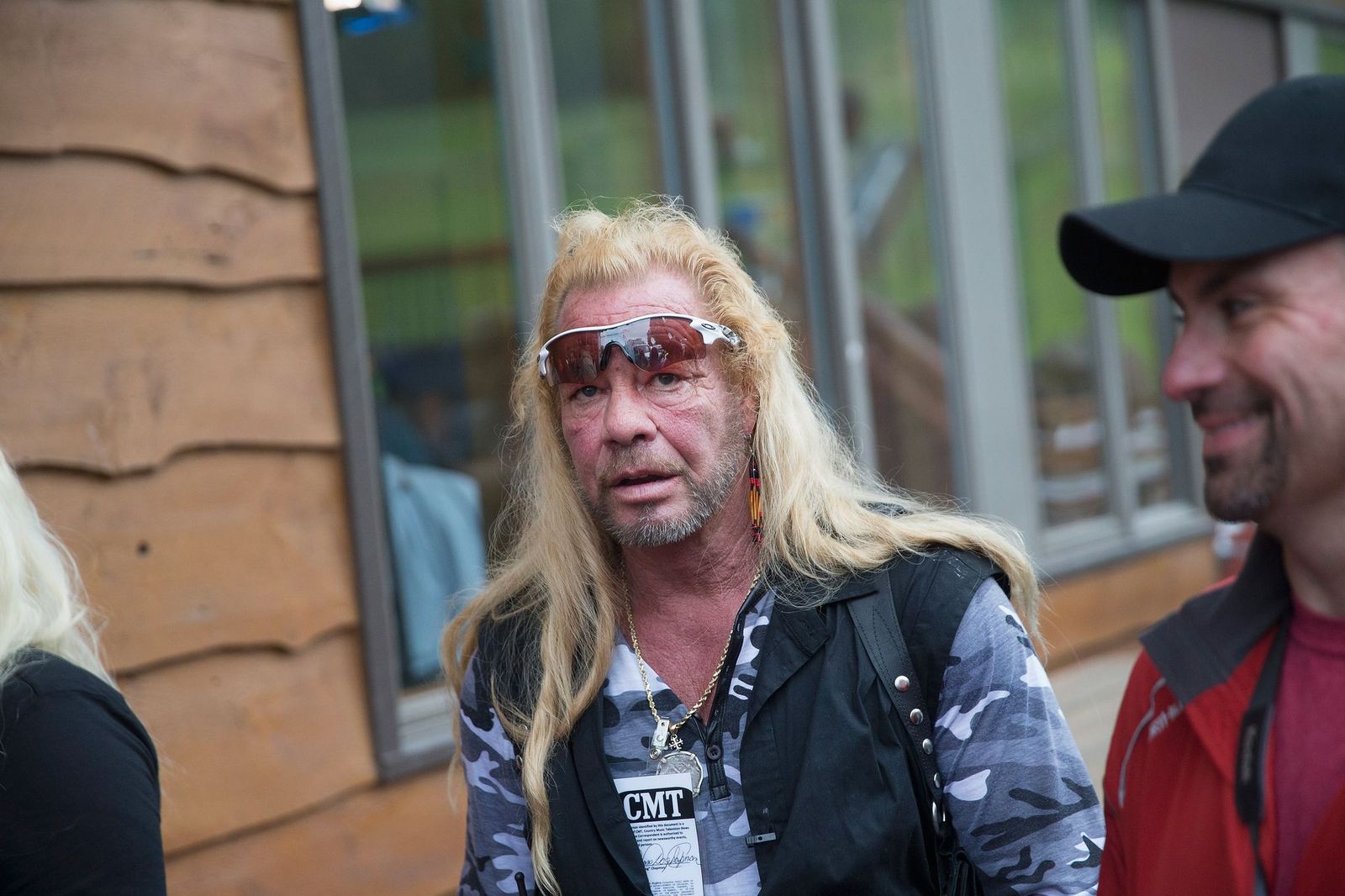 Duane Chapman films a segment of "Dog the Bounty Hunter" outside of a news conference on June 28, 2015, in Malone, New York | Photo: Scott Olson/Getty Images