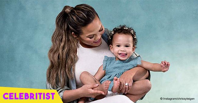 Baby Luna tries to impress mom Chrissy Teigen while singing into a toy microphone