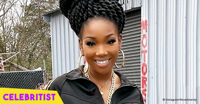 Brandy stuns with red lipstick and colorful outfit after drastic weight gain