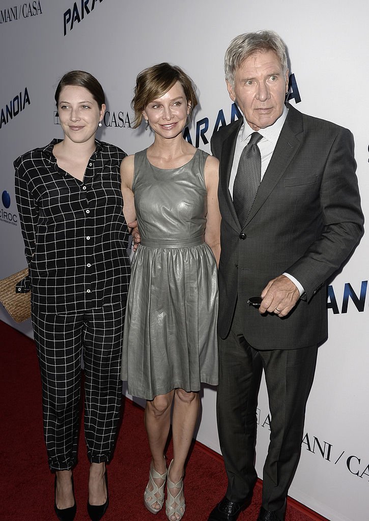 Calista Flockhart (C), Harrison Ford (R) and daughter Georgia (L) attend the premiere of Relativity Media's "Paranoia" at the DGA Theater | Getty Images