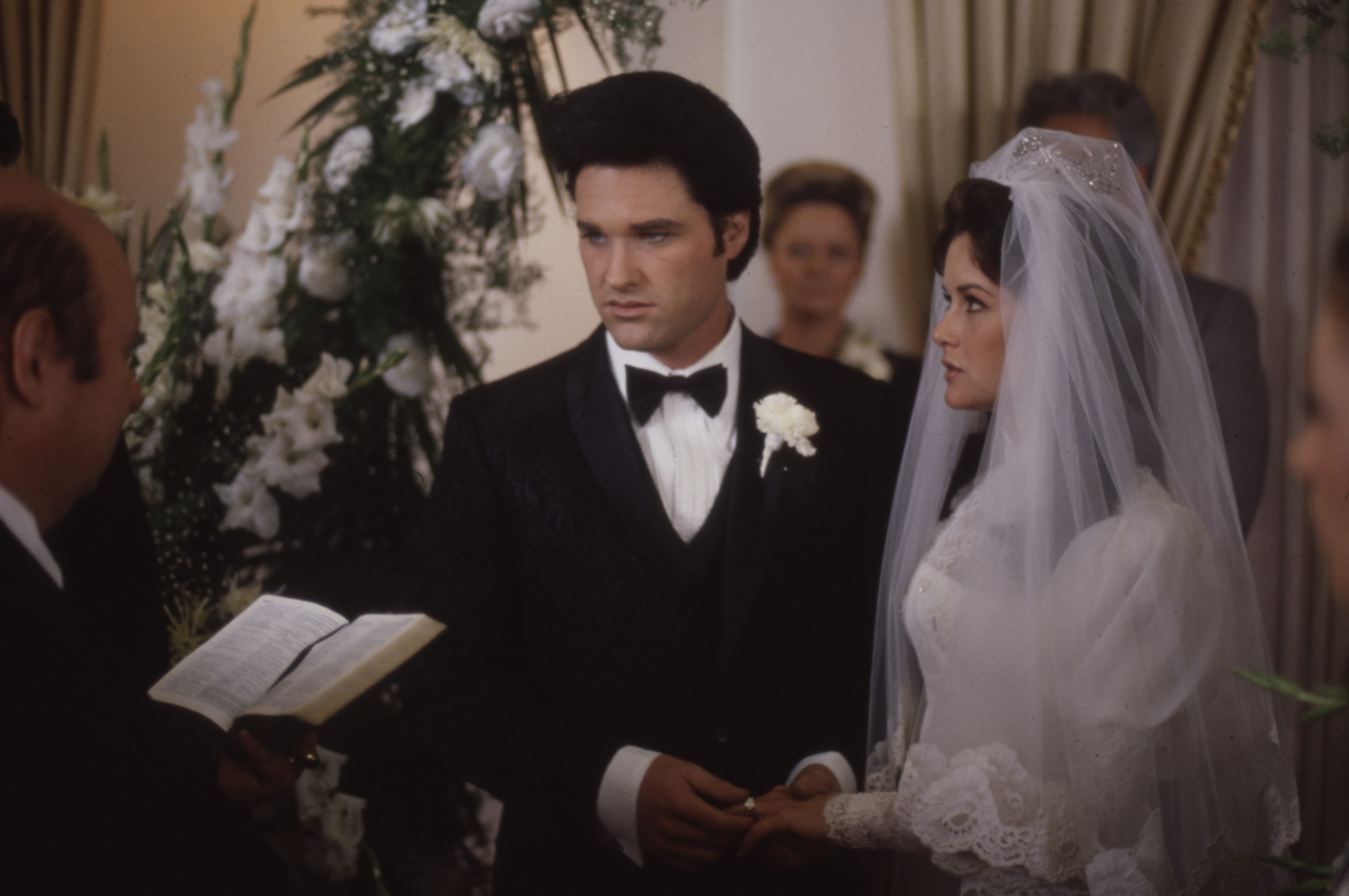 Kurt Russell as Elvis Presley and Season Hubley as Priscilla Presley in ABCs movie 