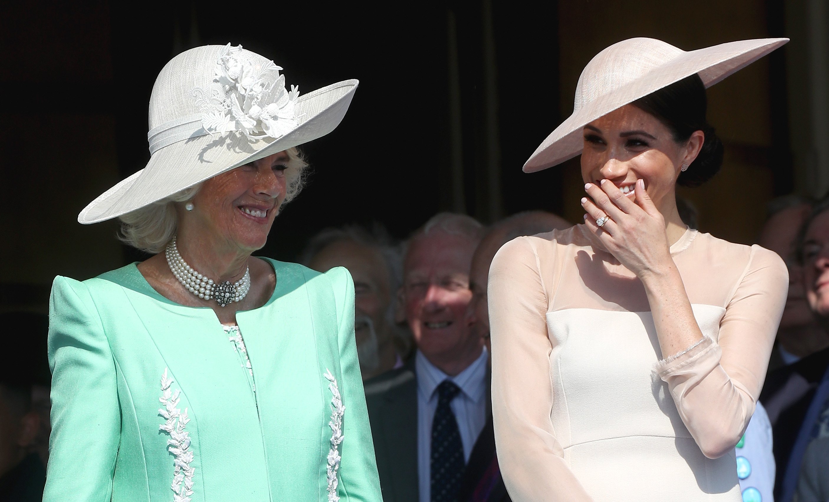 Camilla and Meghan attend The Prince of Wales' 70th Birthday Patronage Celebration held at Buckingham Palace on May 22, 2018, in London, England | Source: Getty Images 