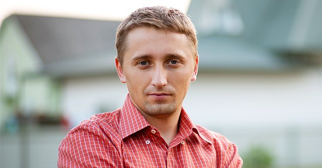 A man with a serious expression stares forward.  | Photo: Shutterstock