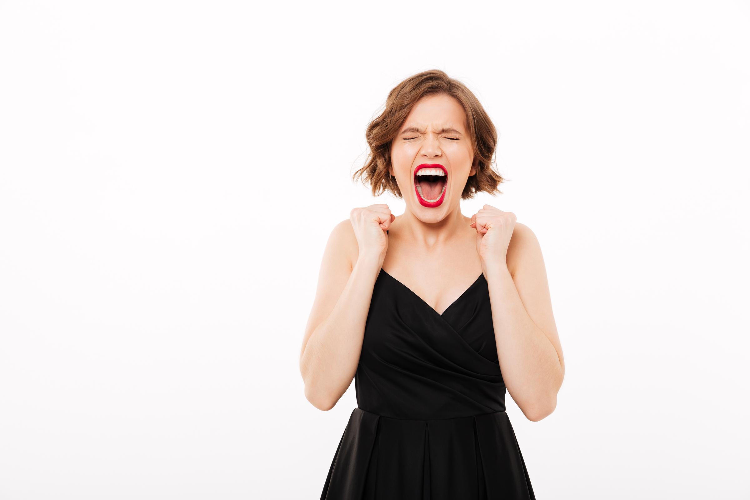 An angry shouting girl | Source: Freepik